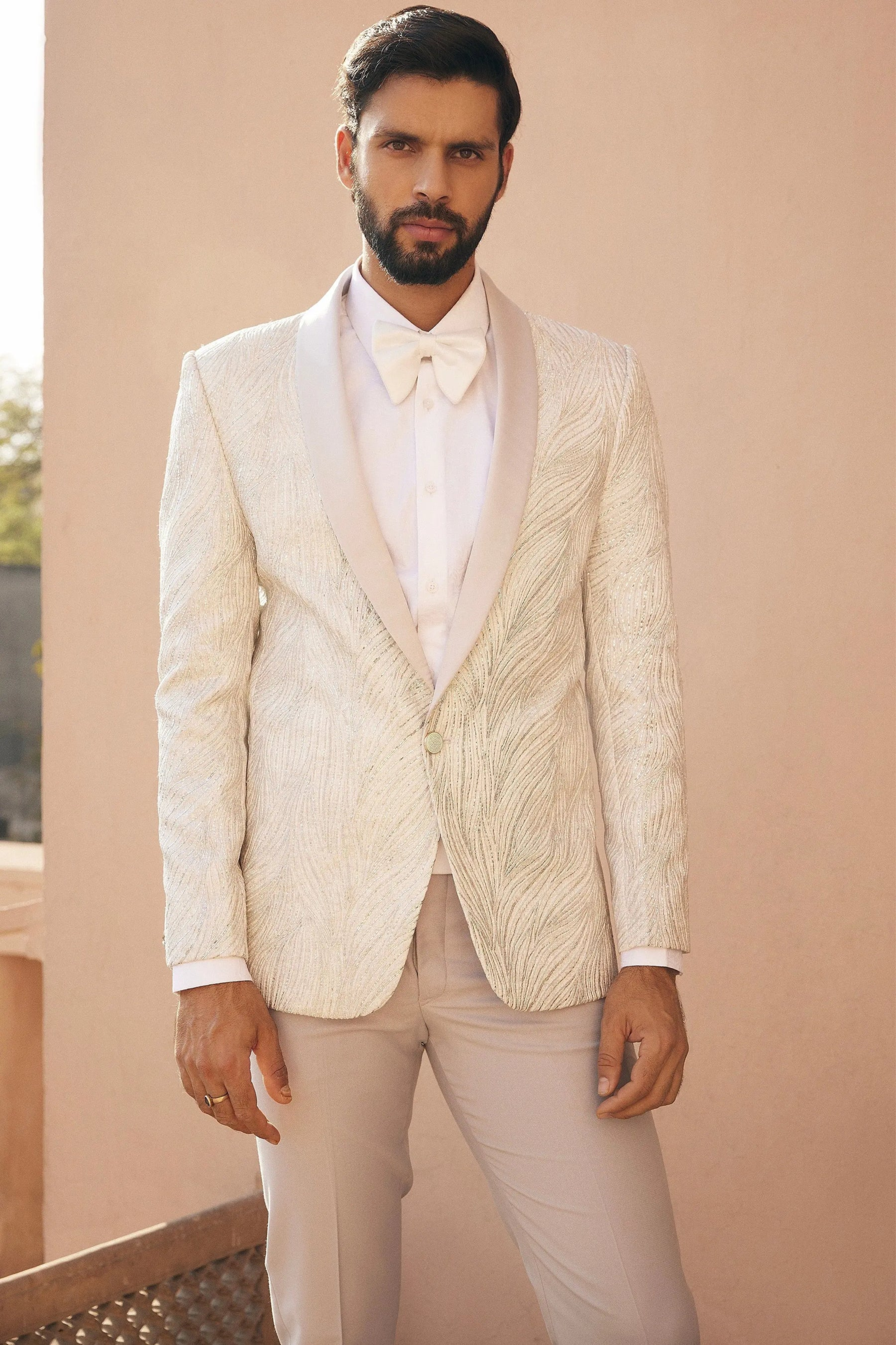 Neil Nitin Mukesh in Pristine Whiteness Tuxedo Set