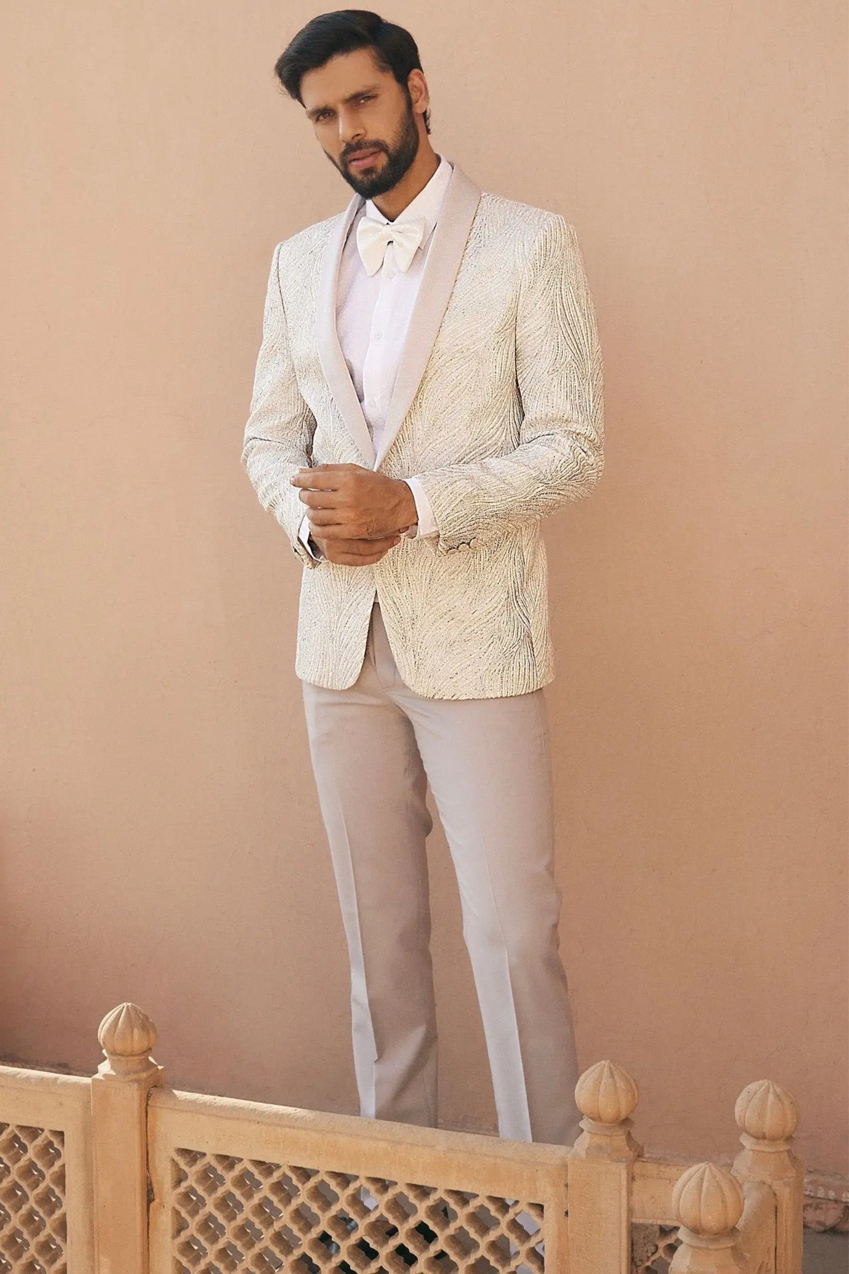 Neil Nitin Mukesh in Pristine Whiteness Tuxedo Set