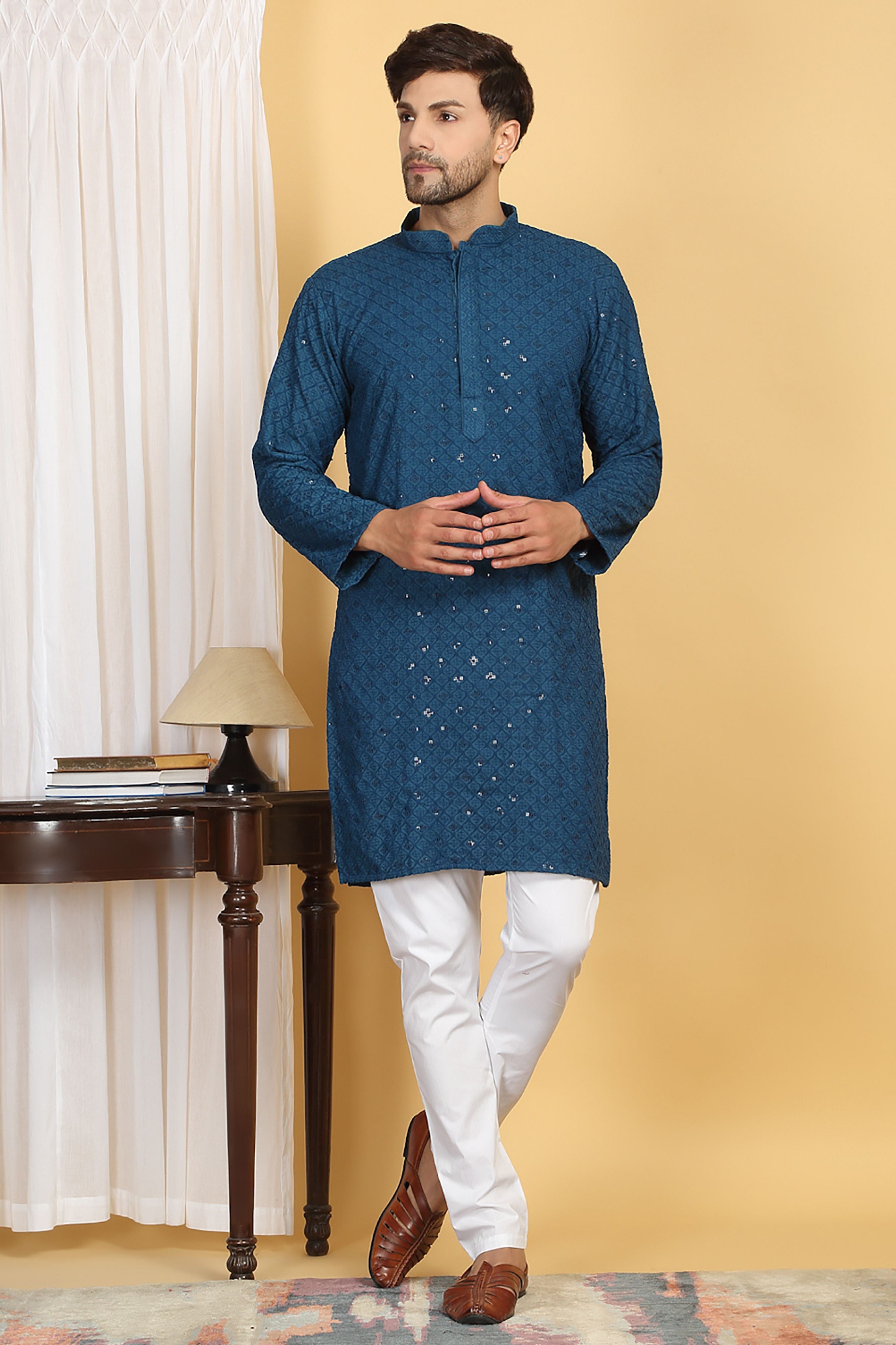 Navyam Embroidered Kurta Churidaar Set