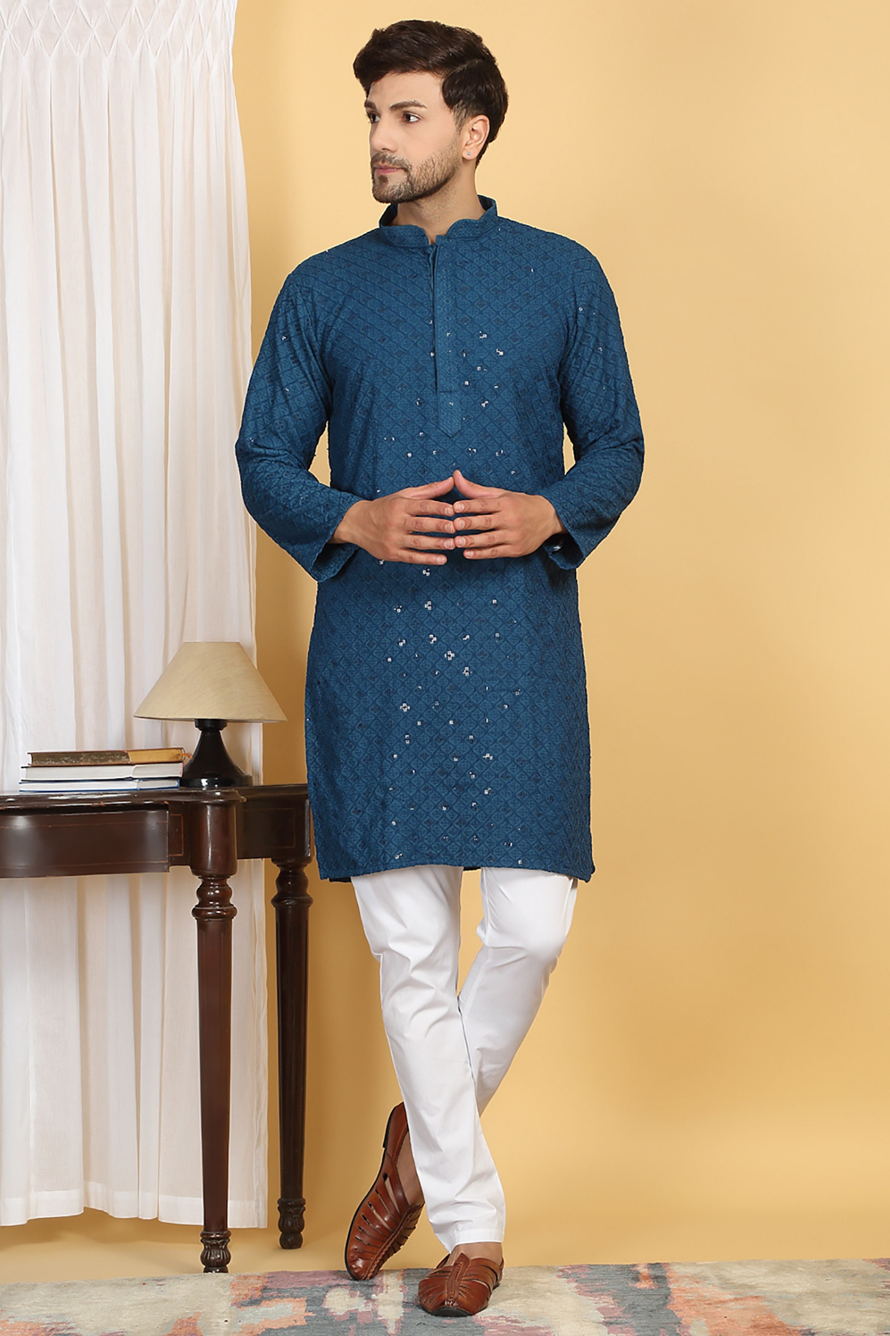 Navyam Embroidered Kurta Churidaar Set