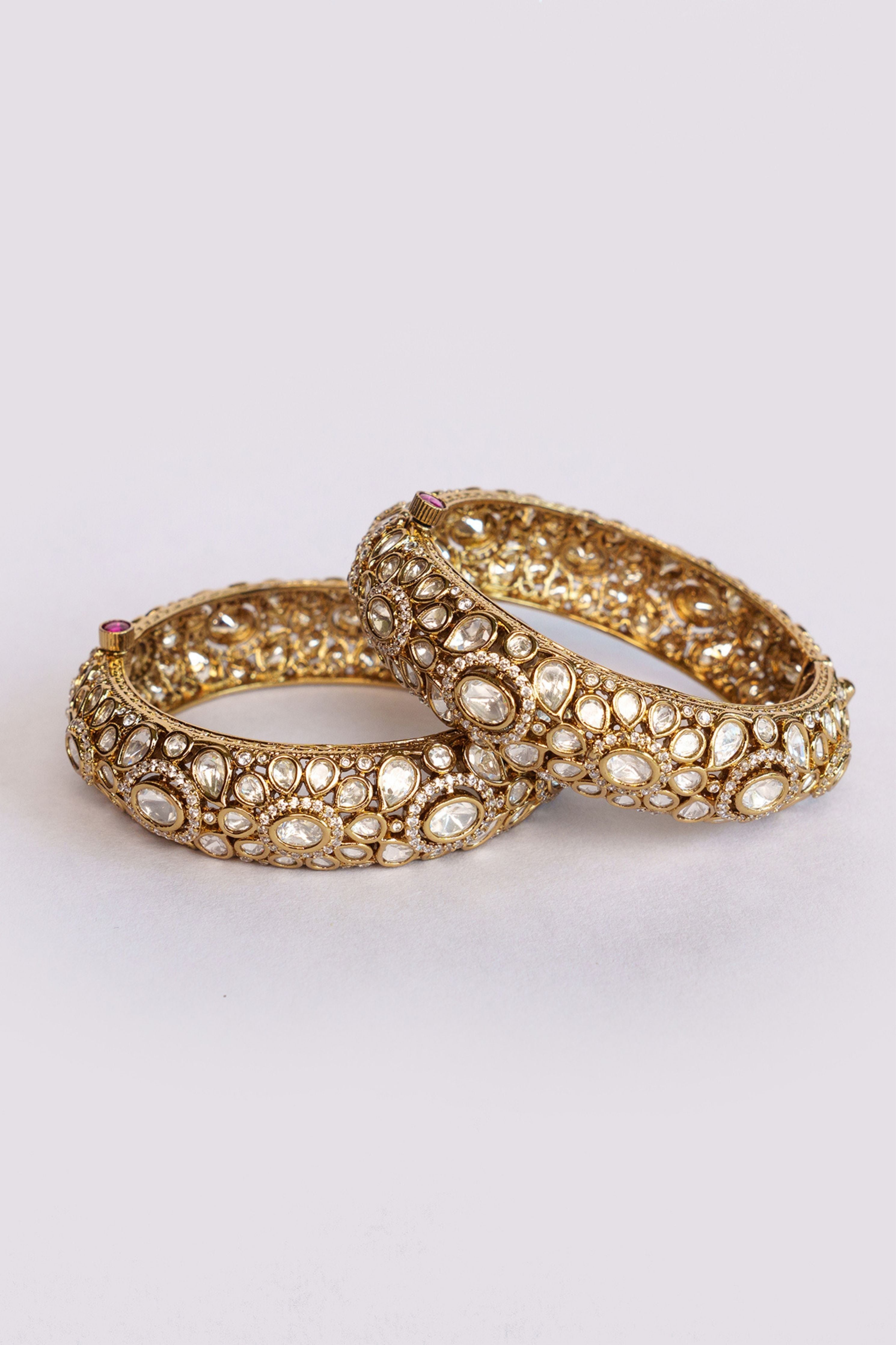 Bold And Dramatic Pair Of Antique Finish Kadas
