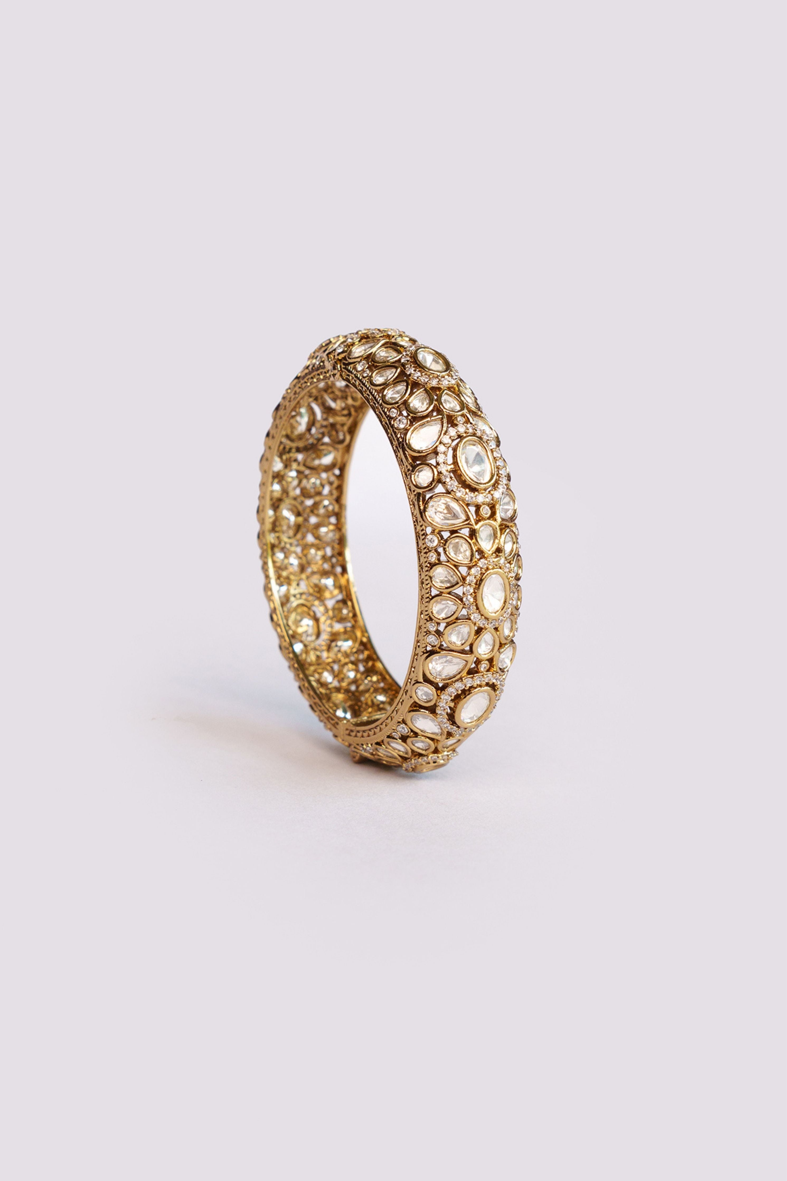 Bold And Dramatic Pair Of Antique Finish Kadas