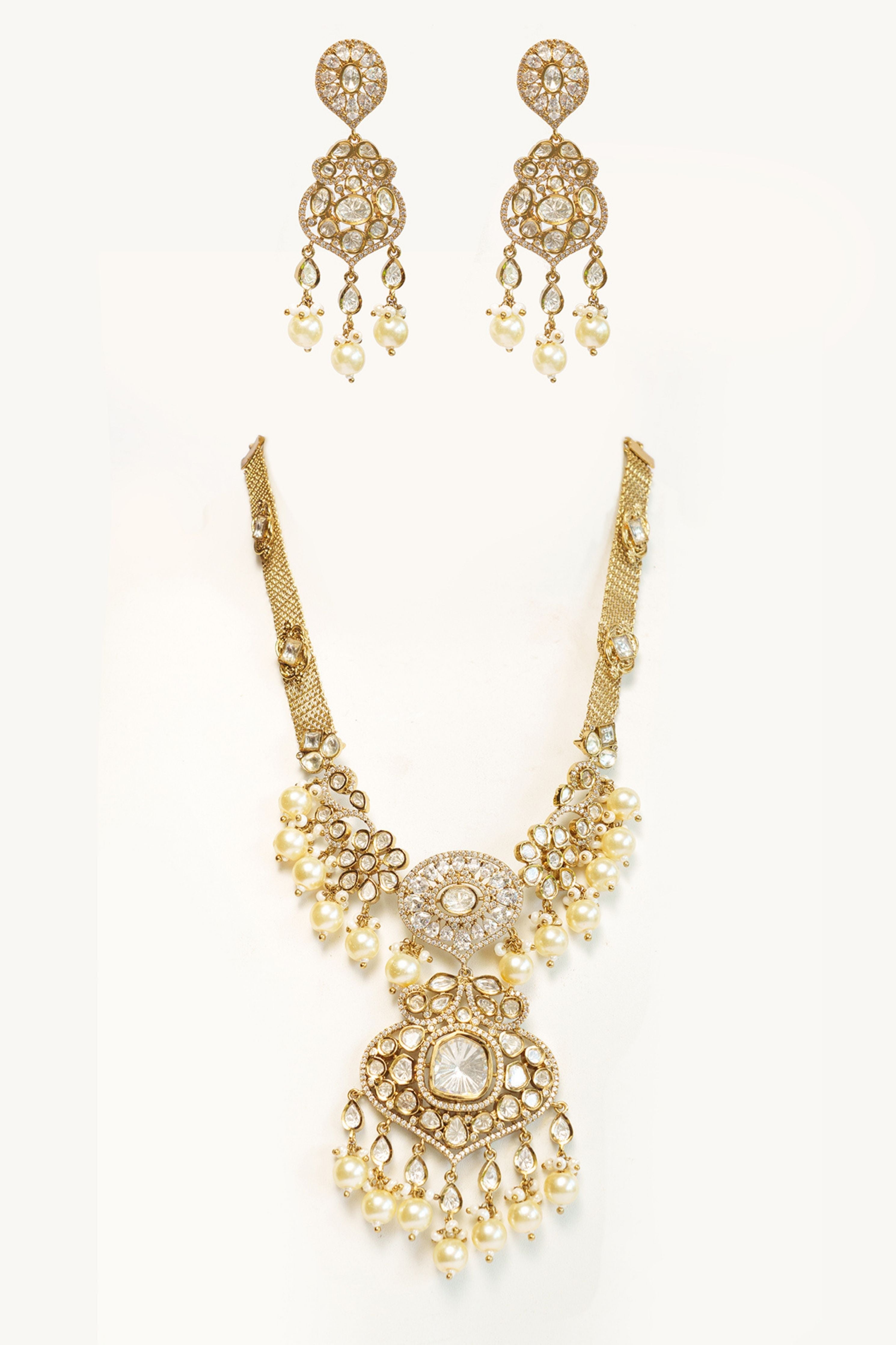 Emanel Bold And Dramatic Two Tone Finish Polki Necklace Set