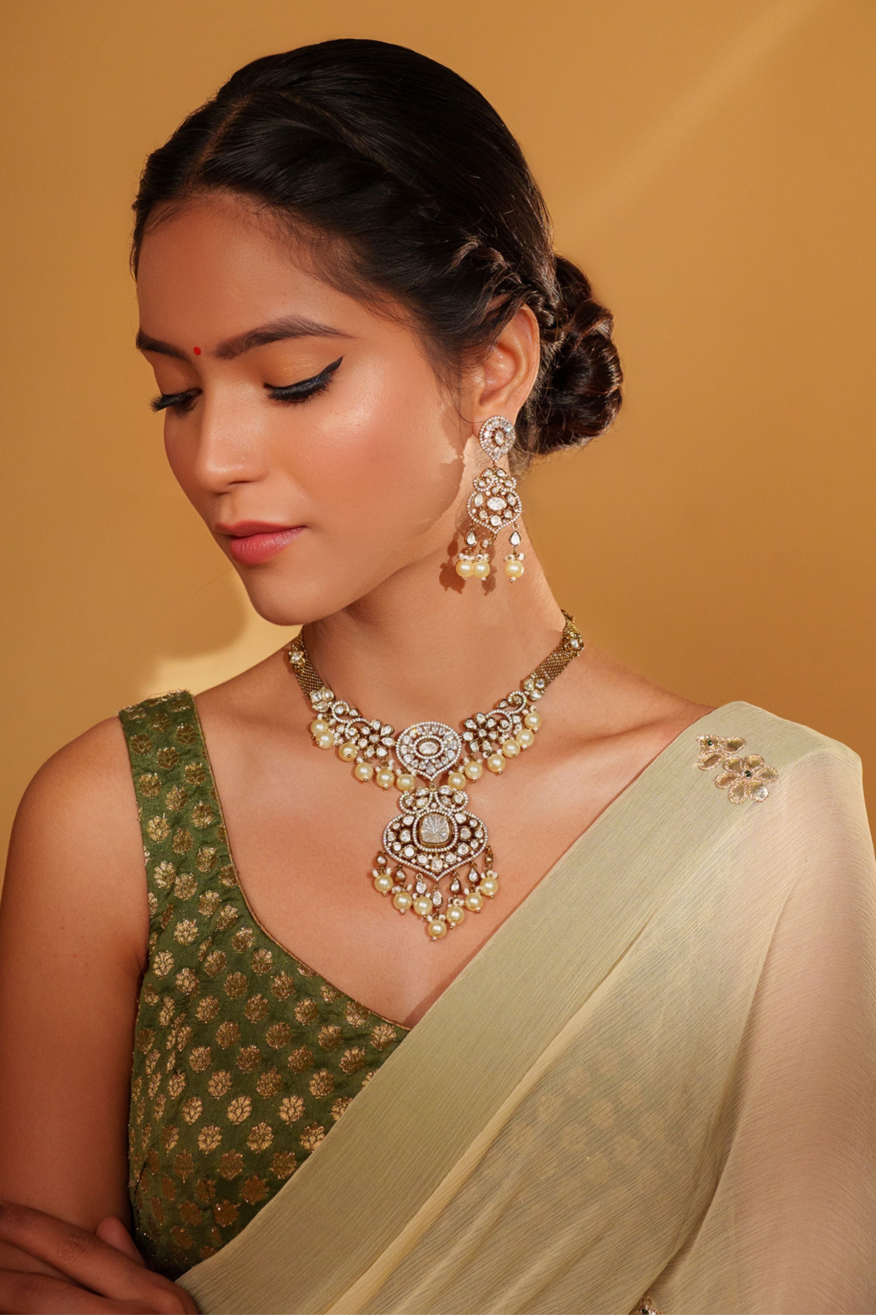 Emanel Bold And Dramatic Two Tone Finish Polki Necklace Set