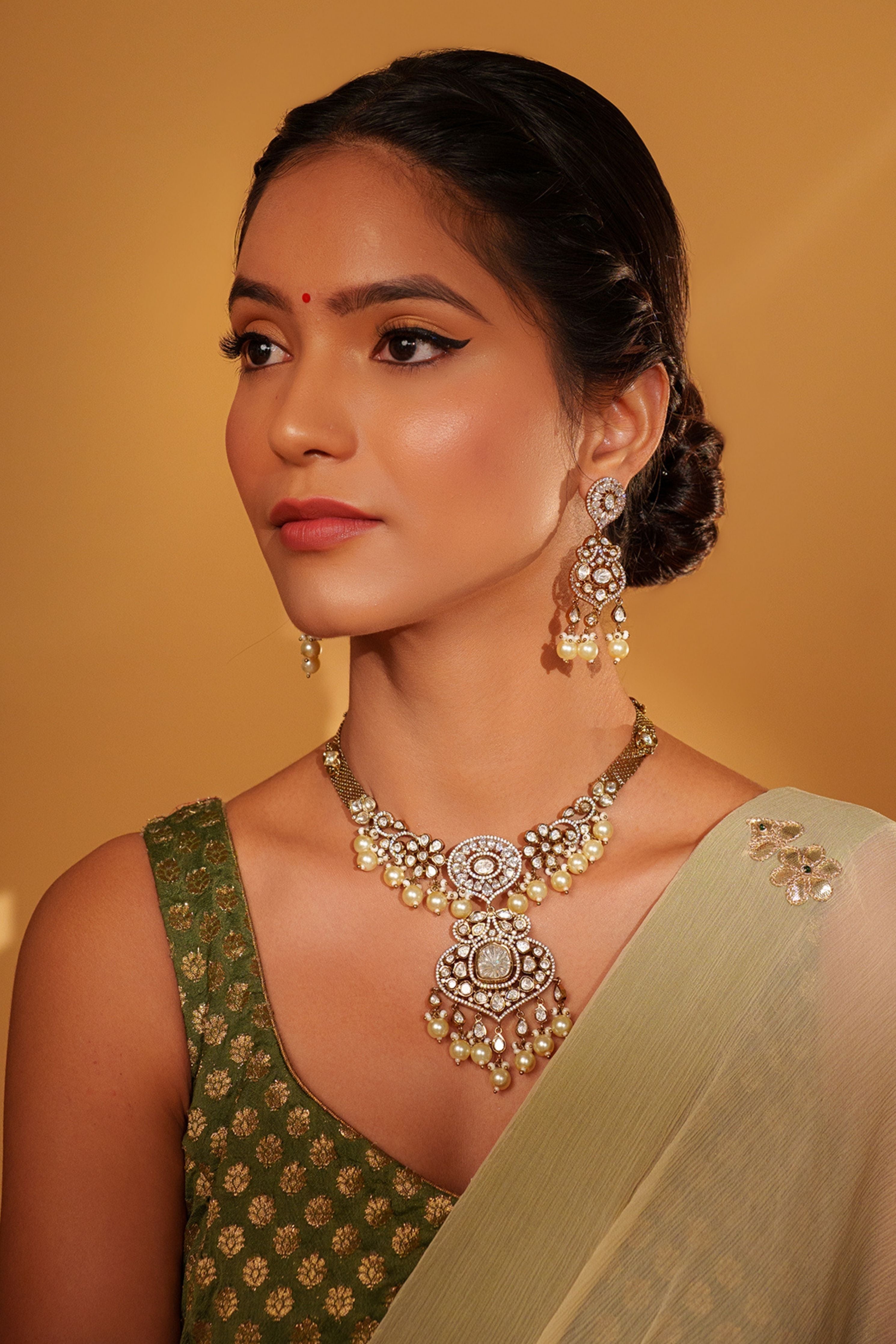 Emanel Bold And Dramatic Two Tone Finish Polki Necklace Set