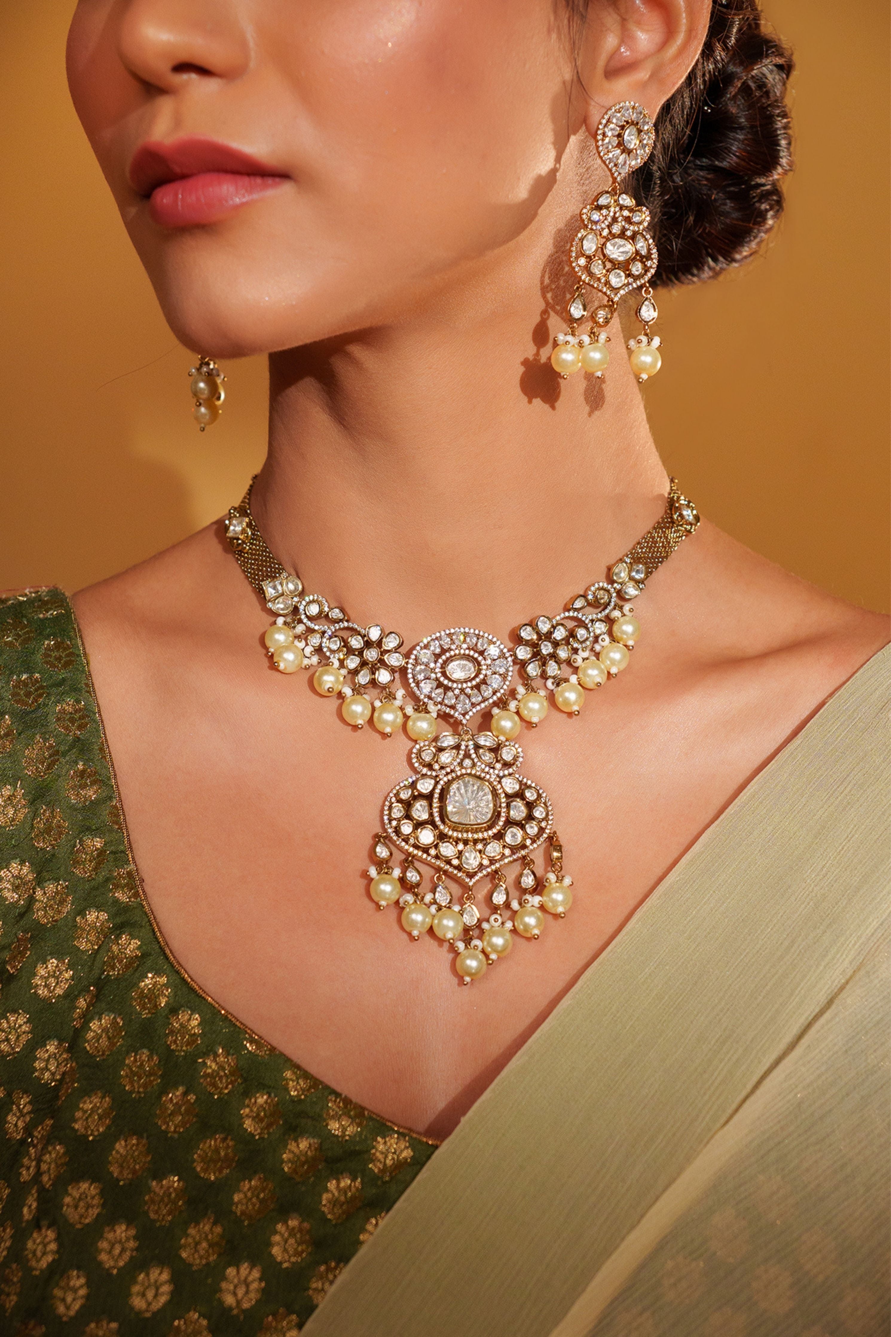 Emanel Bold And Dramatic Two Tone Finish Polki Necklace Set
