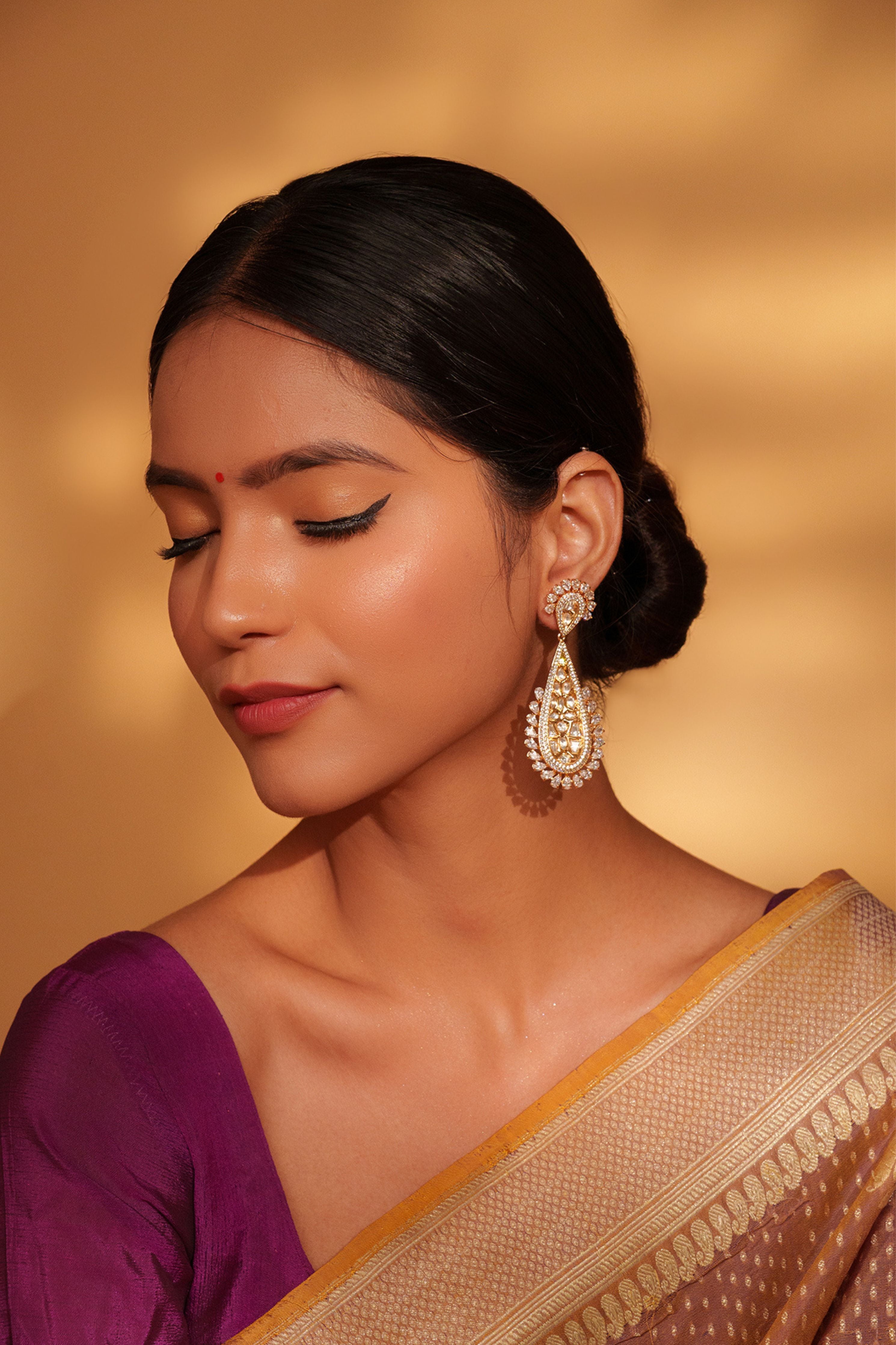 Gold Bold And Elegant Kundan Danglers