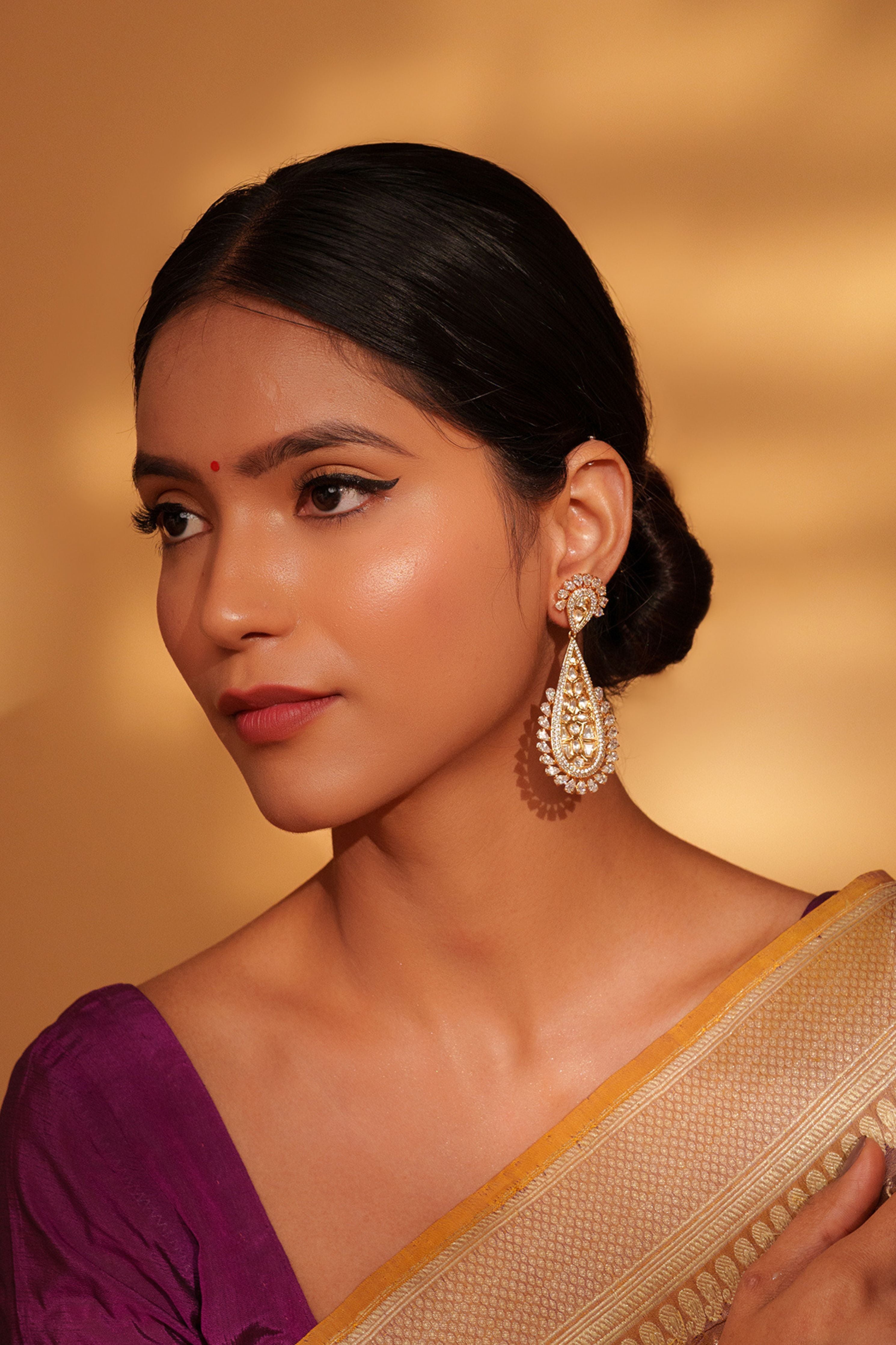 Gold Bold And Elegant Kundan Danglers