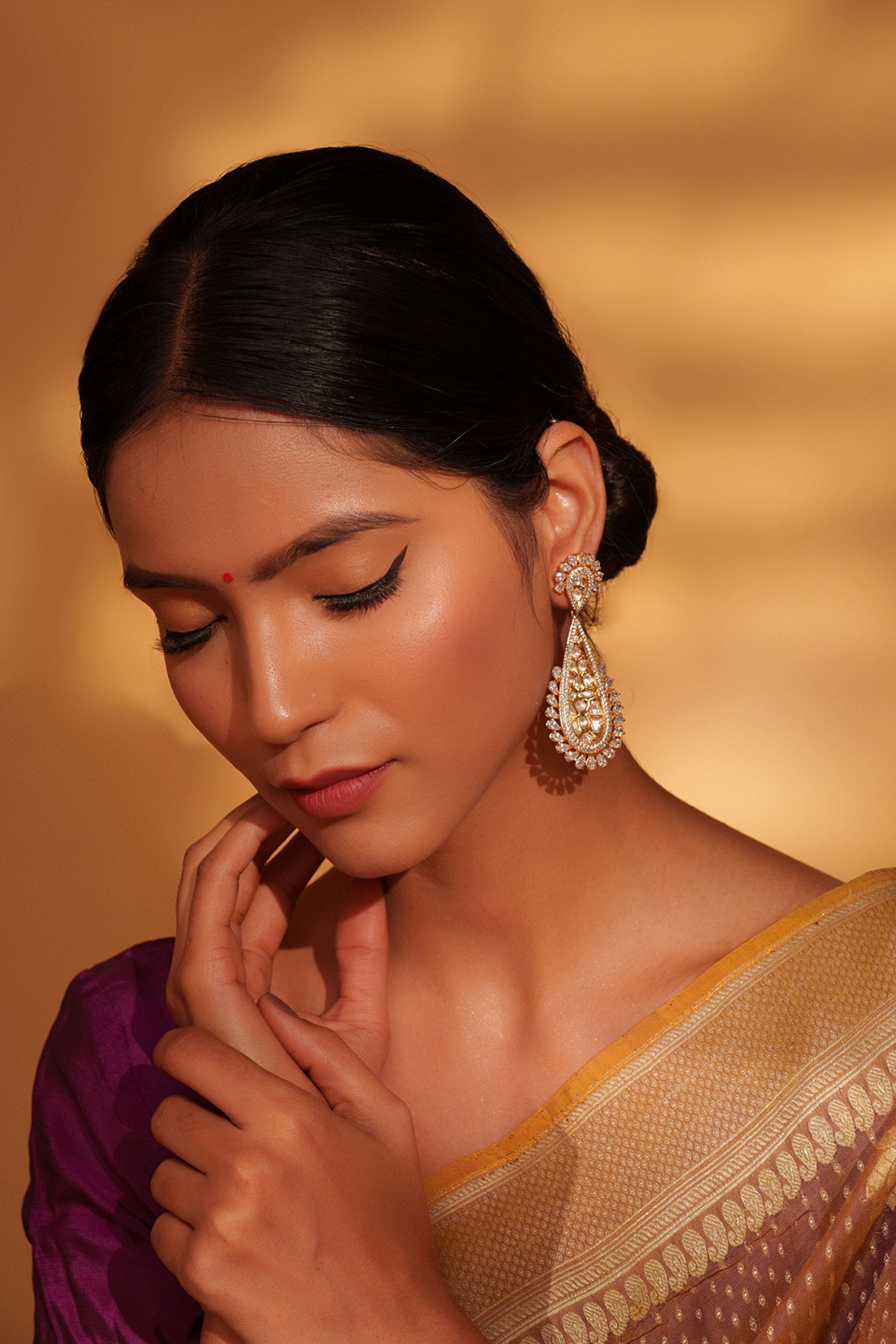 Gold Bold And Elegant Kundan Danglers