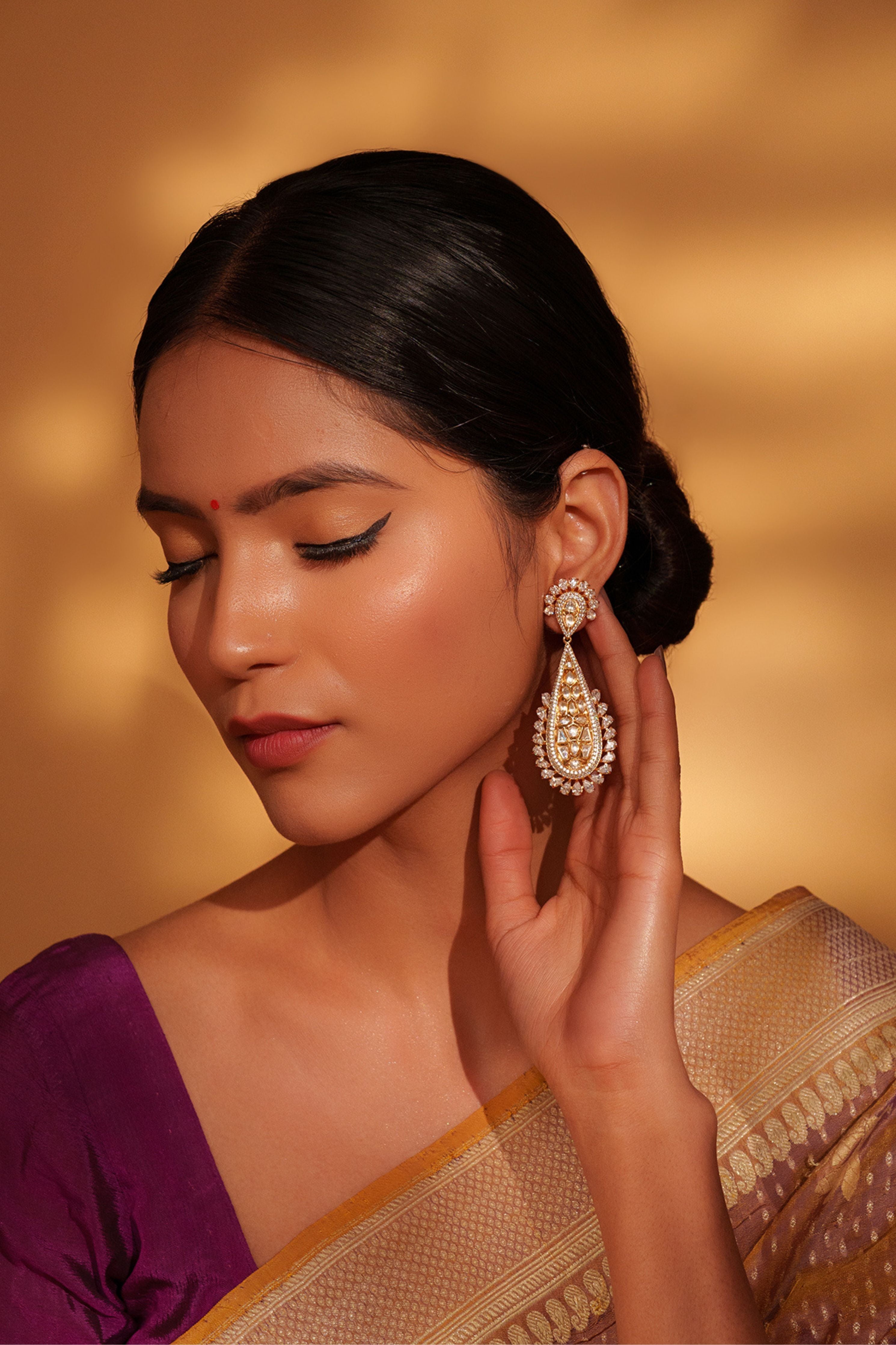 Gold Bold And Elegant Kundan Danglers