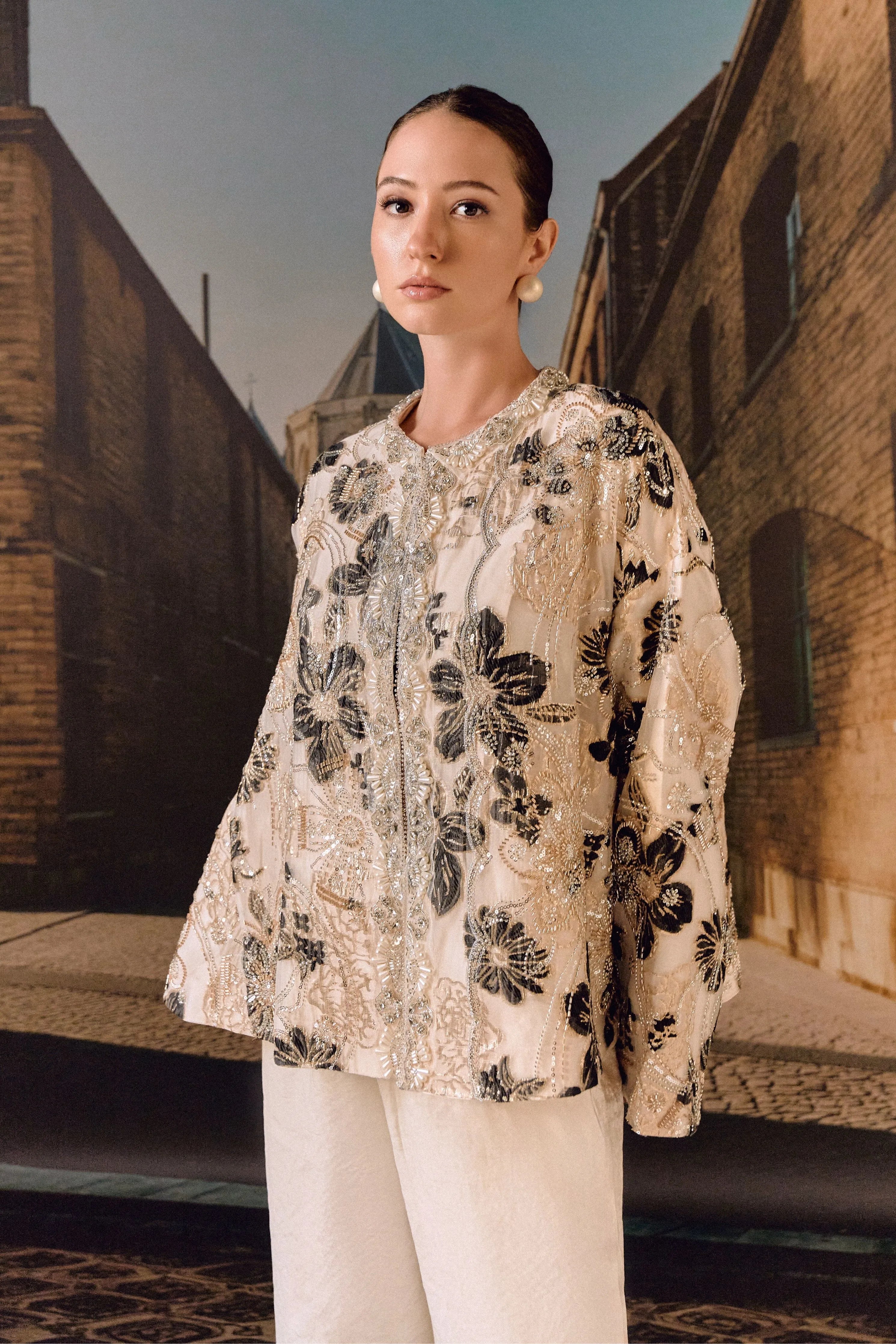 Cape jacket with floral embroidery