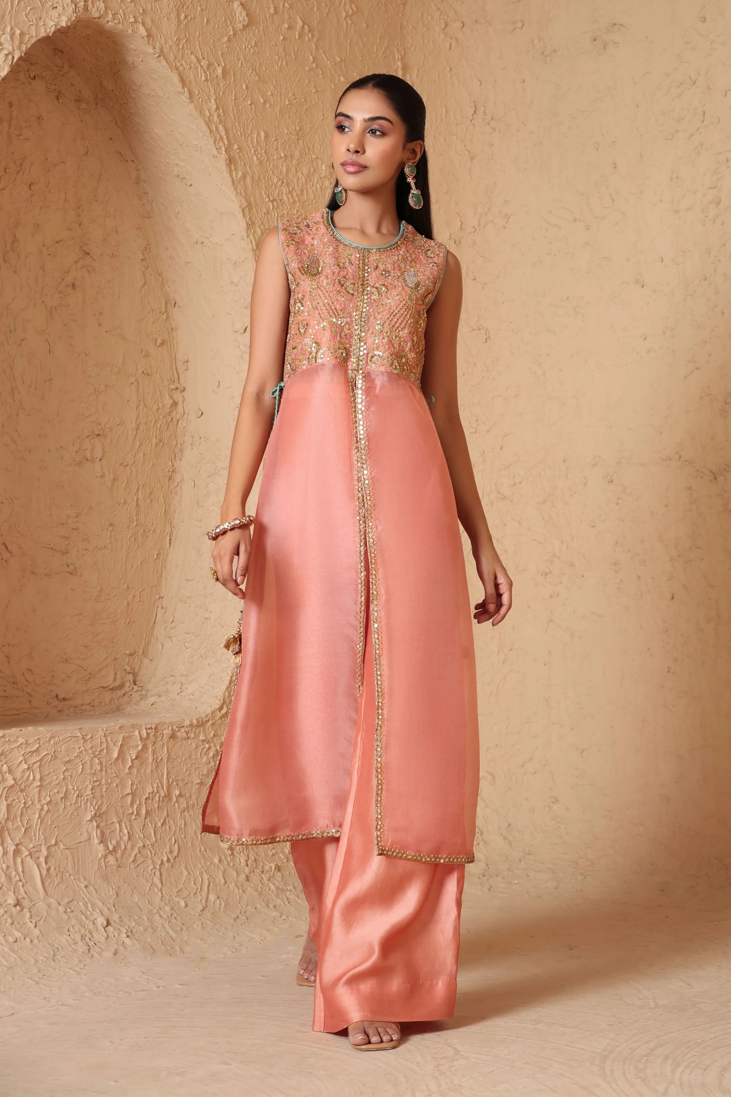 Mehrang Peach Tie-up Sleeveless Kurta Set