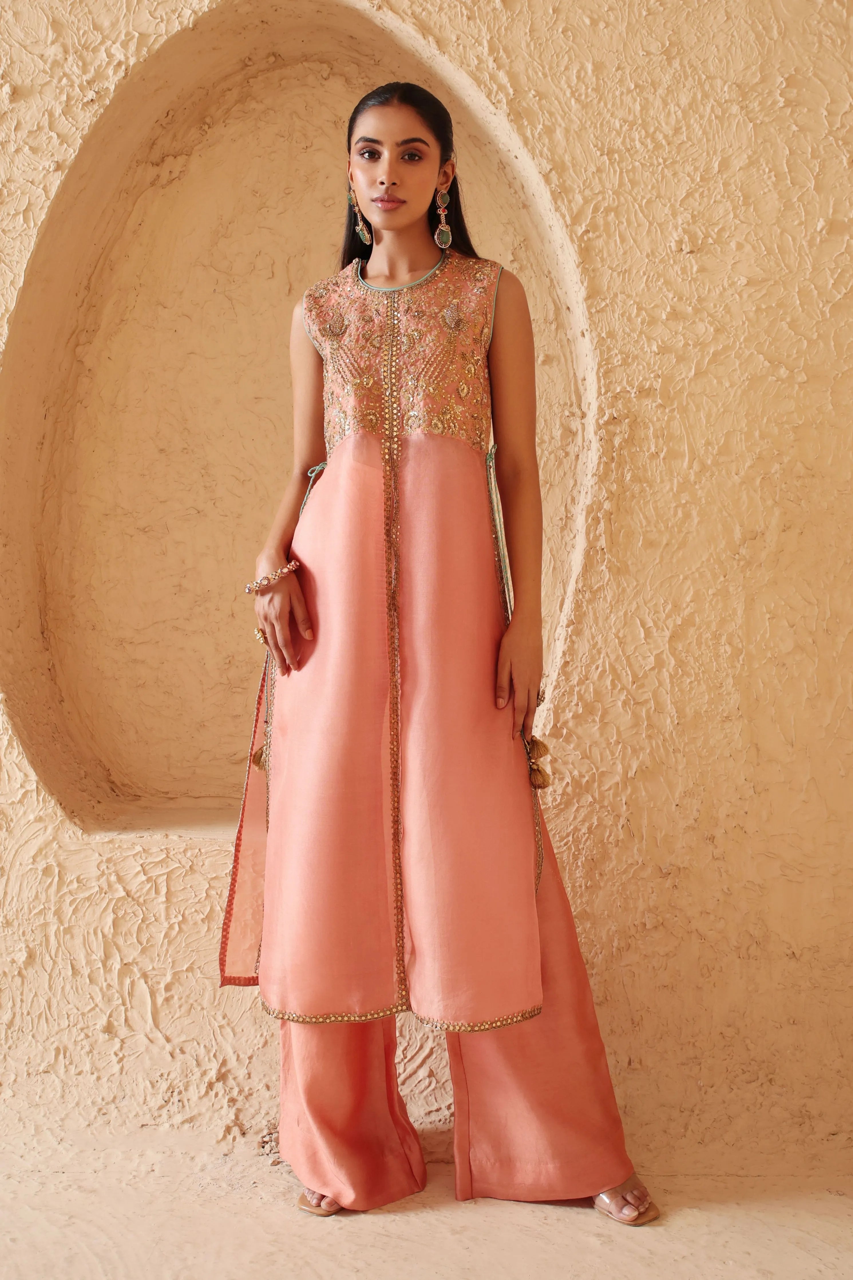 Mehrang Peach Tie-up Sleeveless Kurta Set