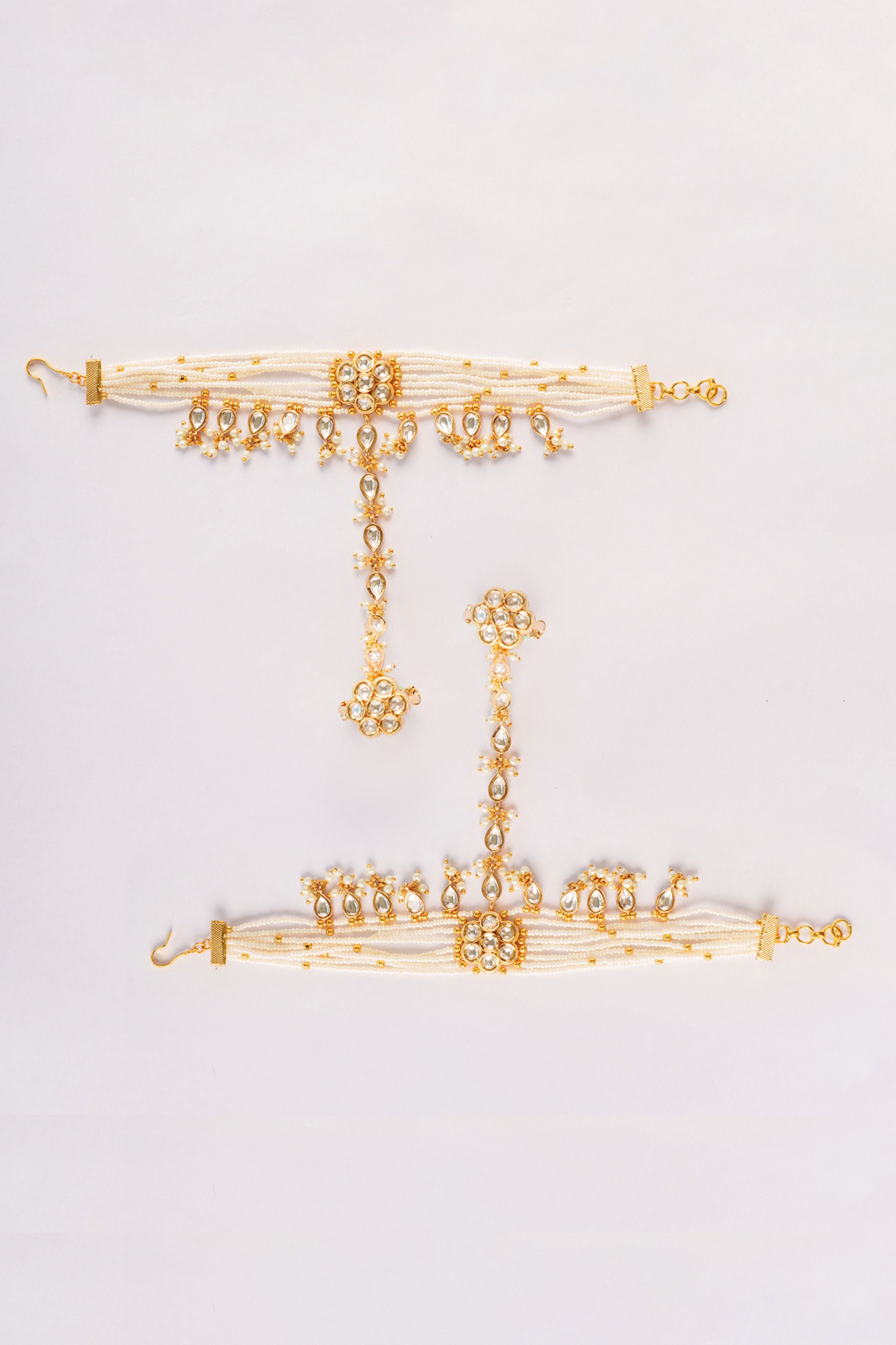 Navratna Elegant And Stylish Pair Of Kundan Haathphools