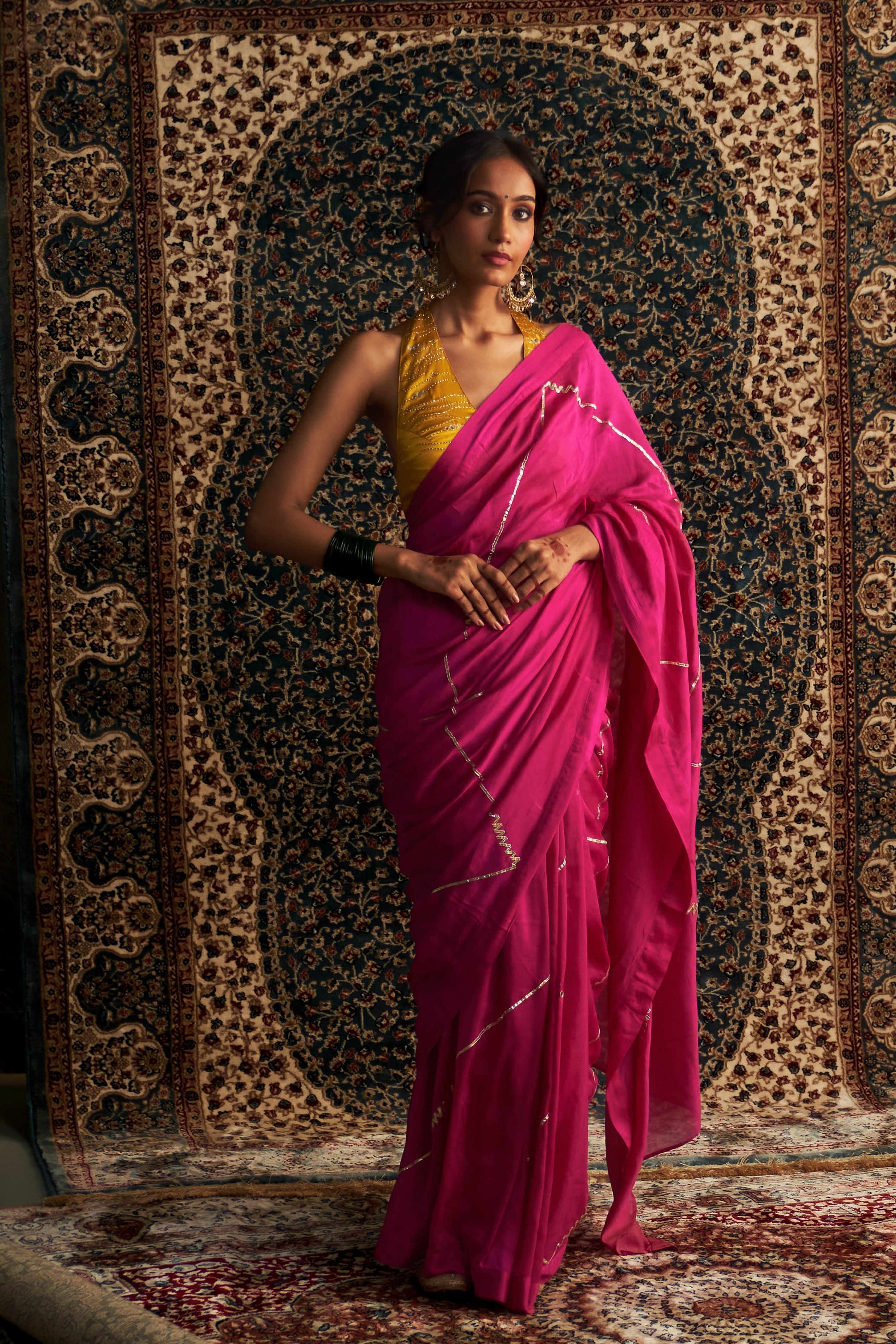 Rani Pink Embroidered Chanderi Saree with Marigold Halter Neck Blouse