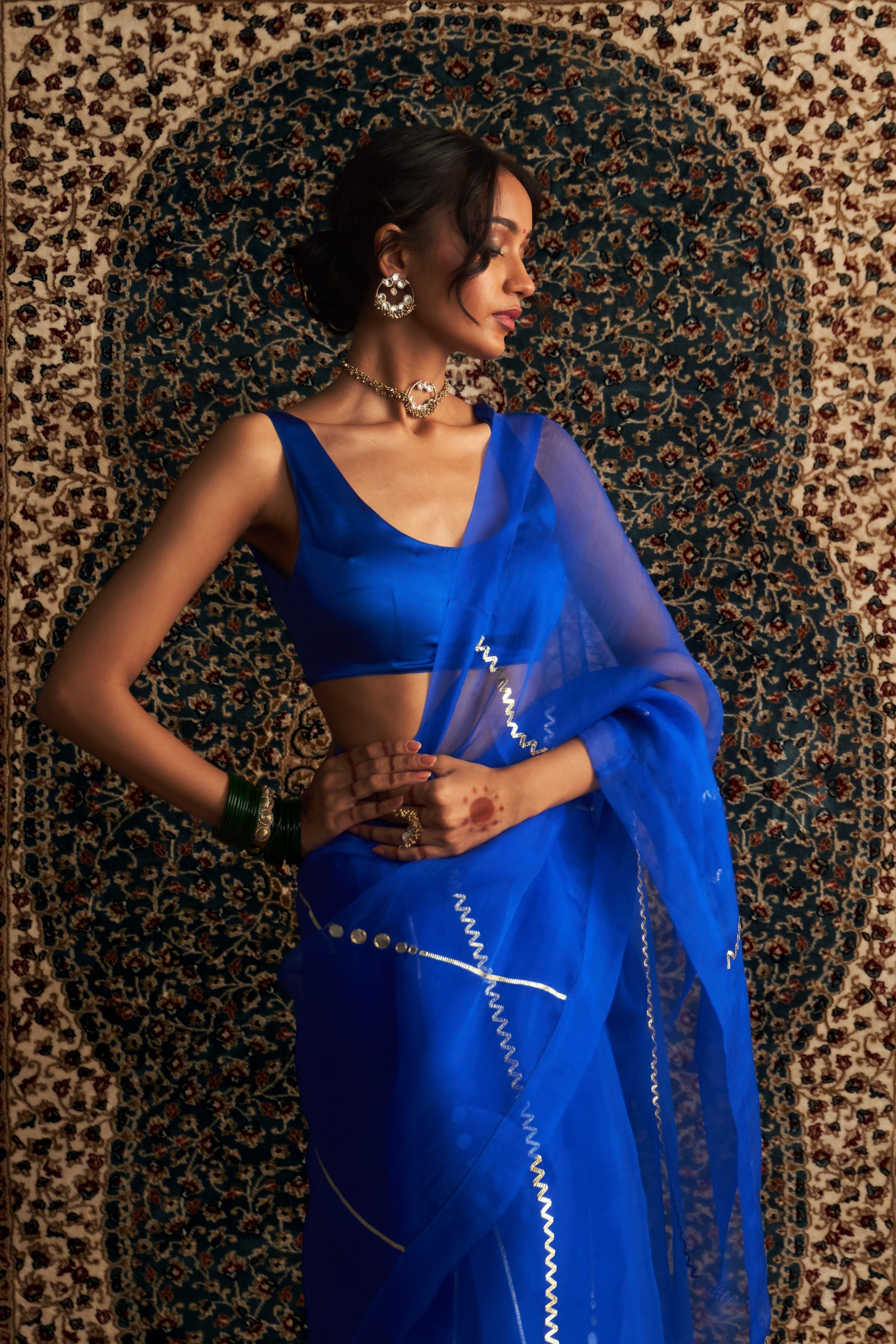 Blue Embroidered Organza saree With Blue Sleeveless Blouse
