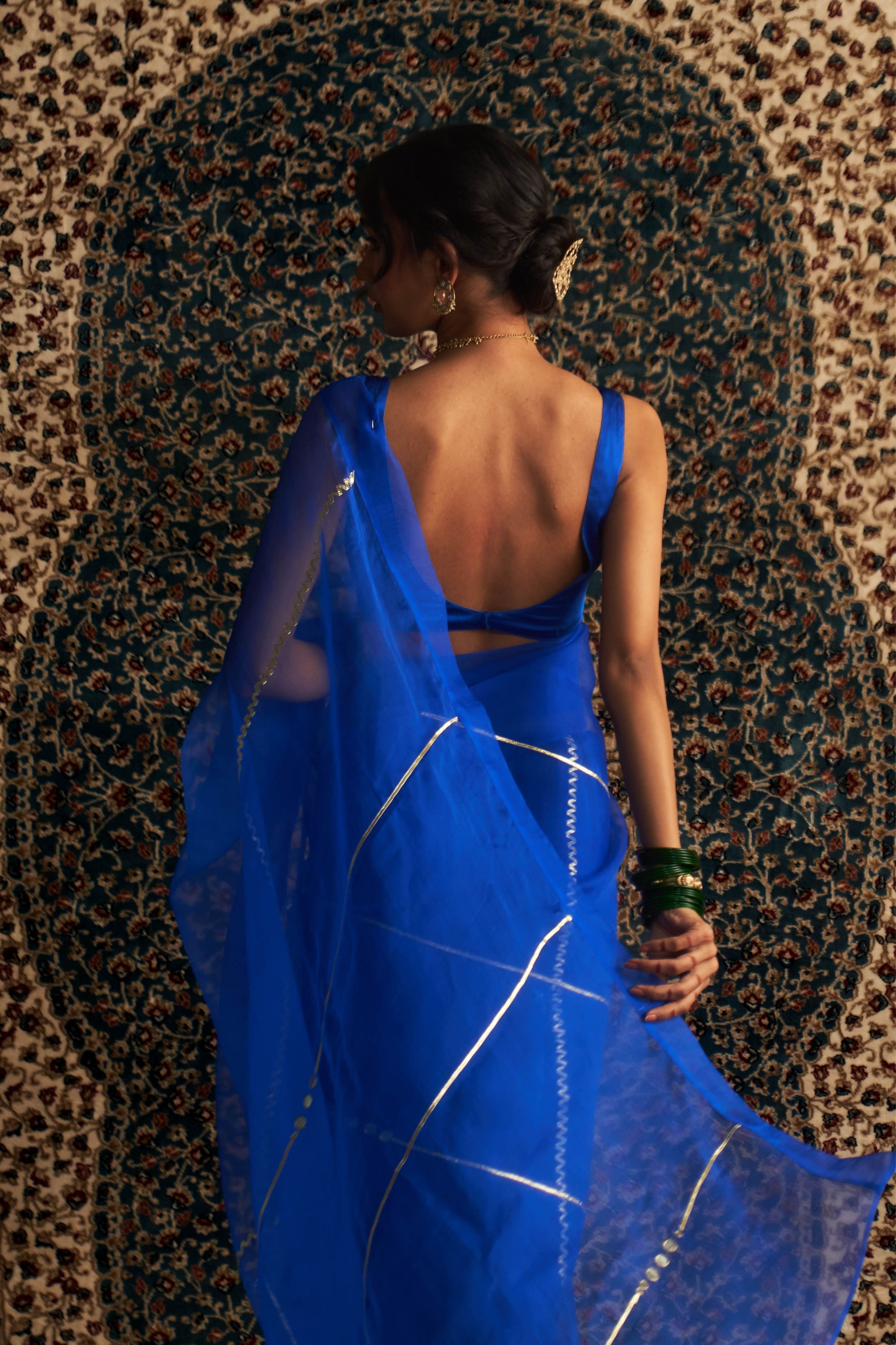 Blue Embroidered Organza saree With Blue Sleeveless Blouse