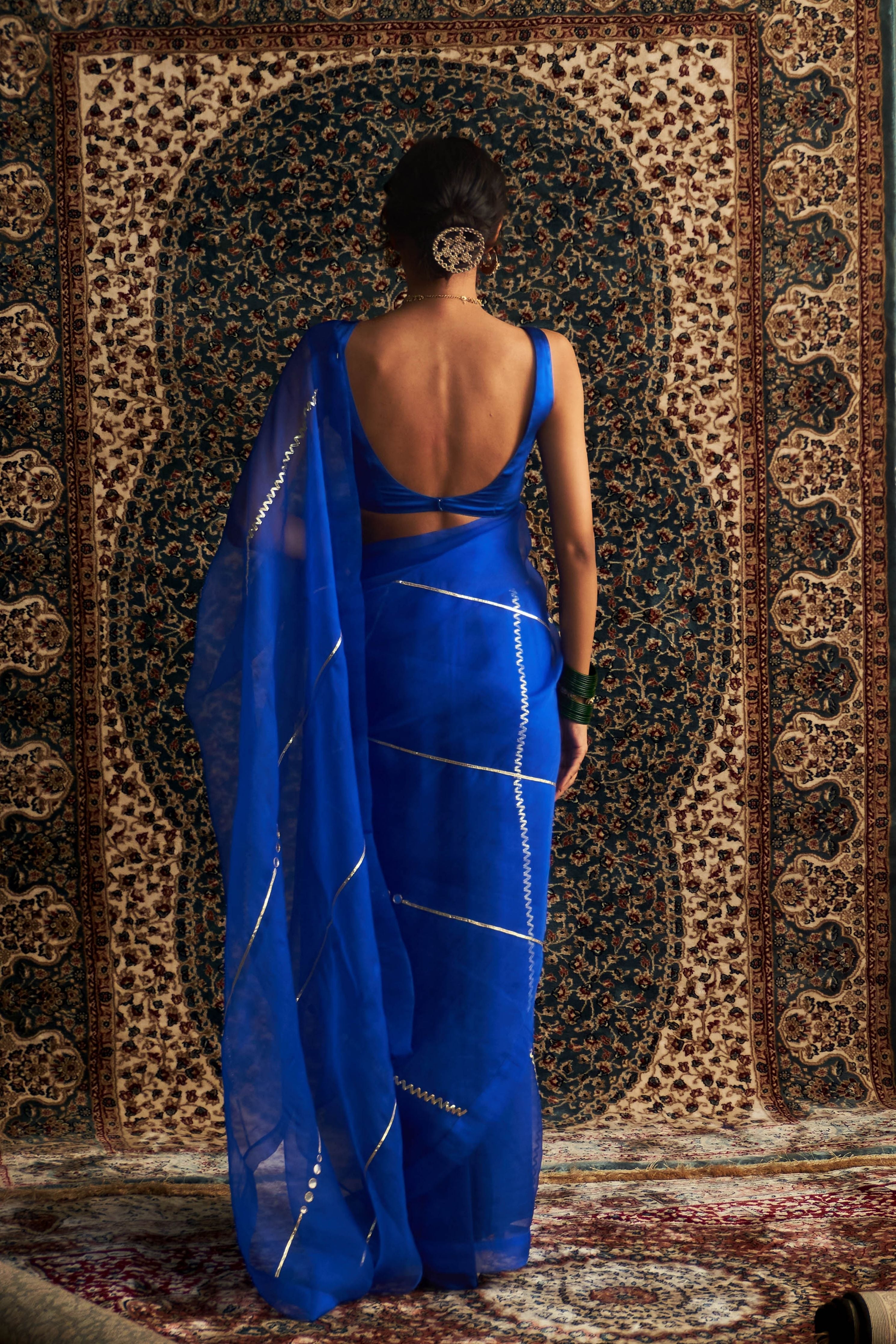 Blue Embroidered Organza saree With Blue Sleeveless Blouse