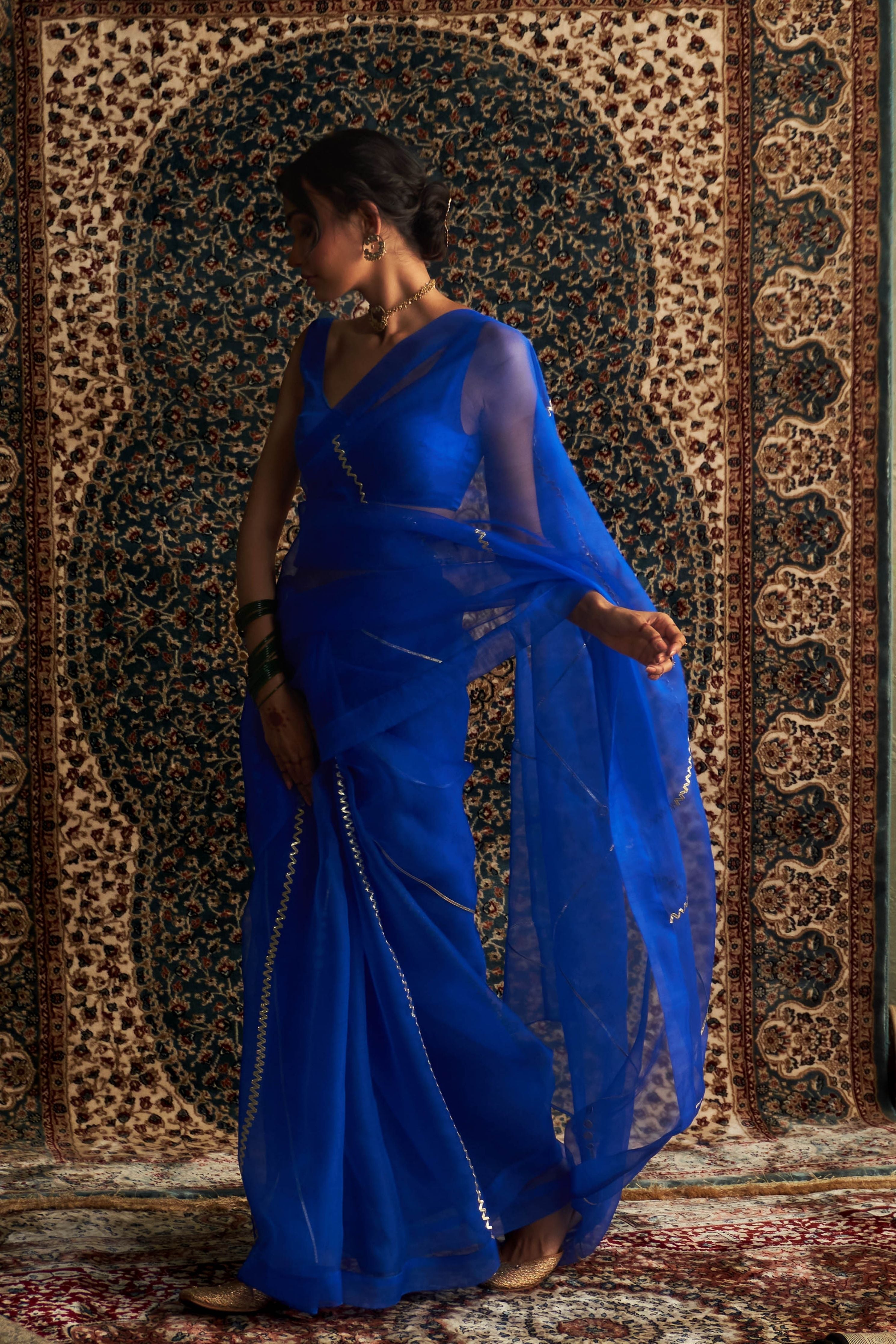 Blue Embroidered Organza saree With Blue Sleeveless Blouse