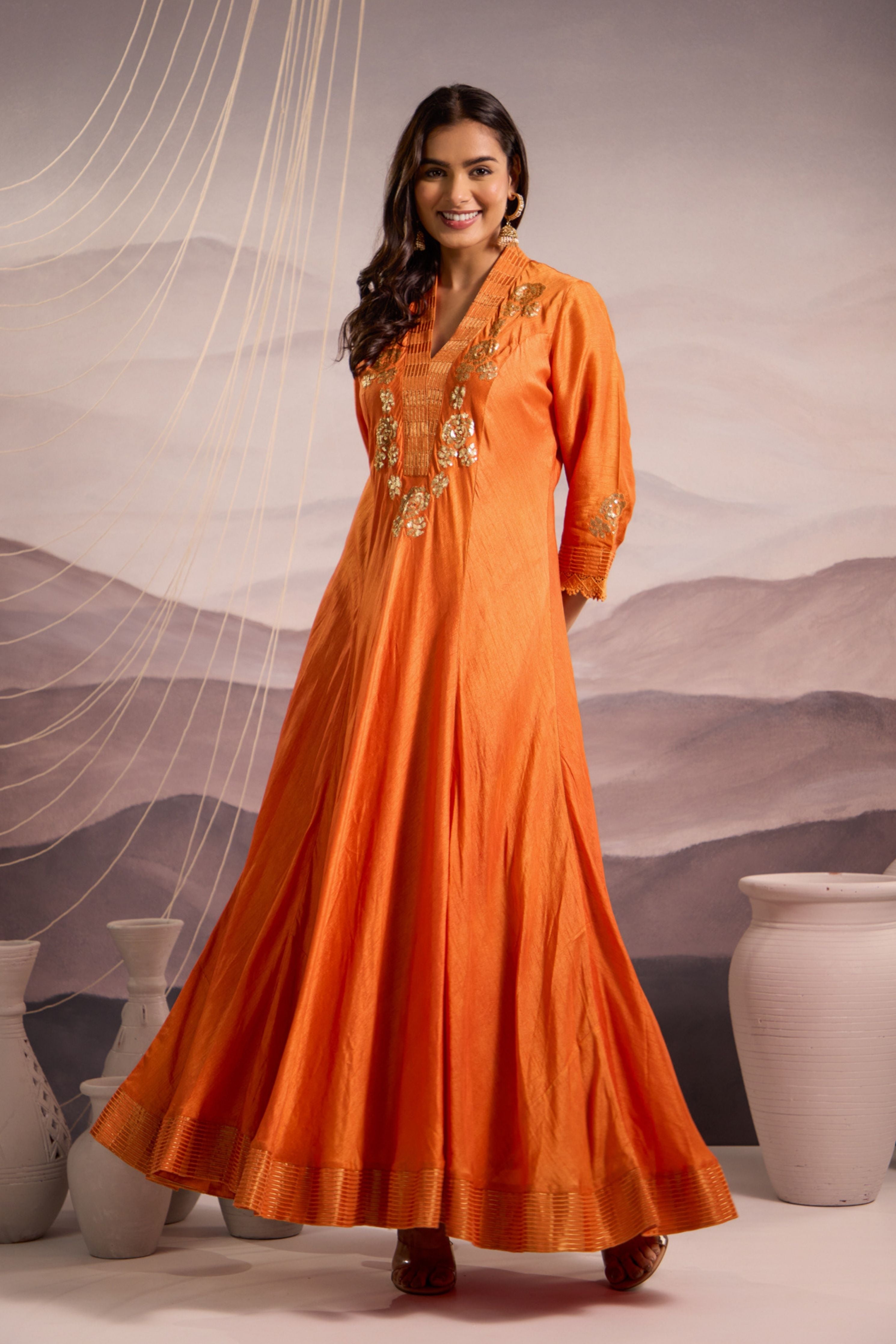Orange sequin embroidered flared panelled kurta