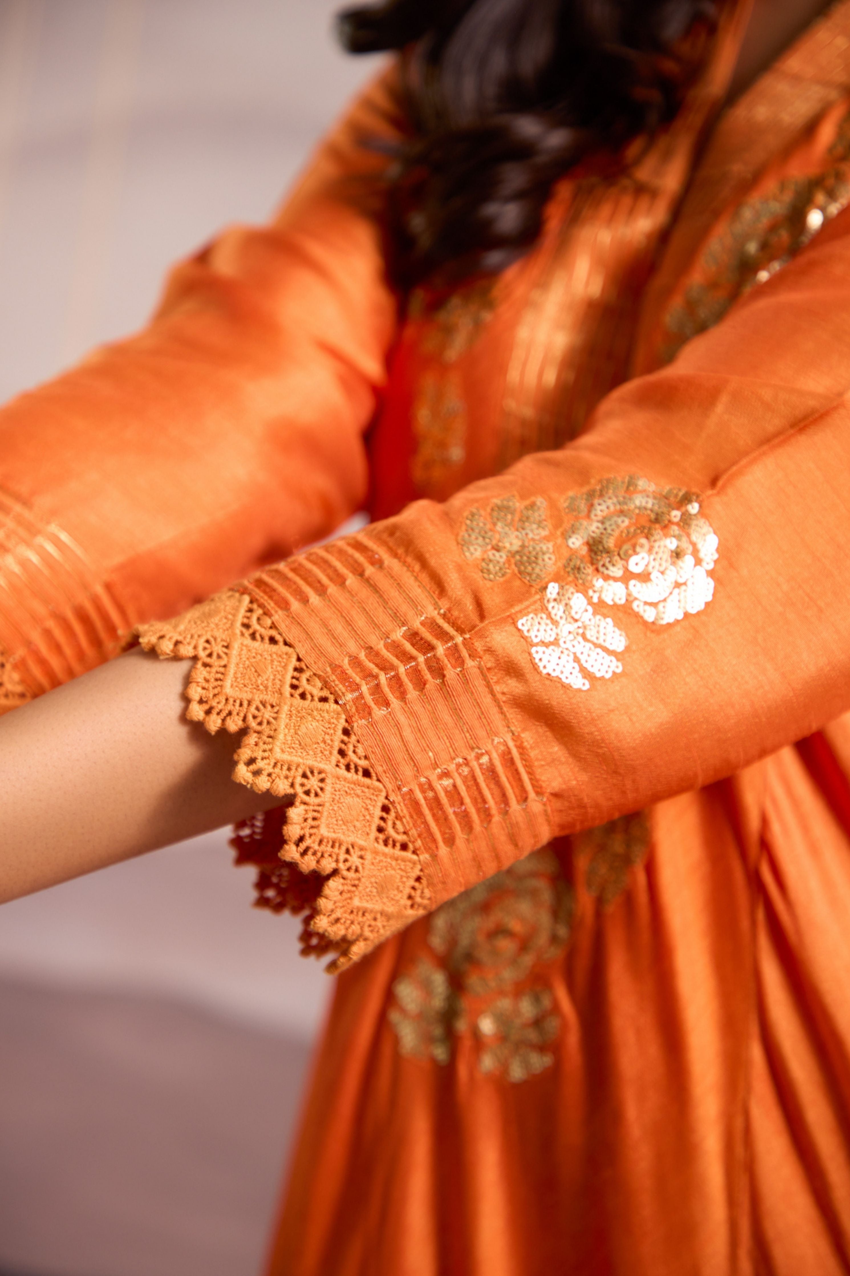 Orange sequin embroidered flared panelled kurta