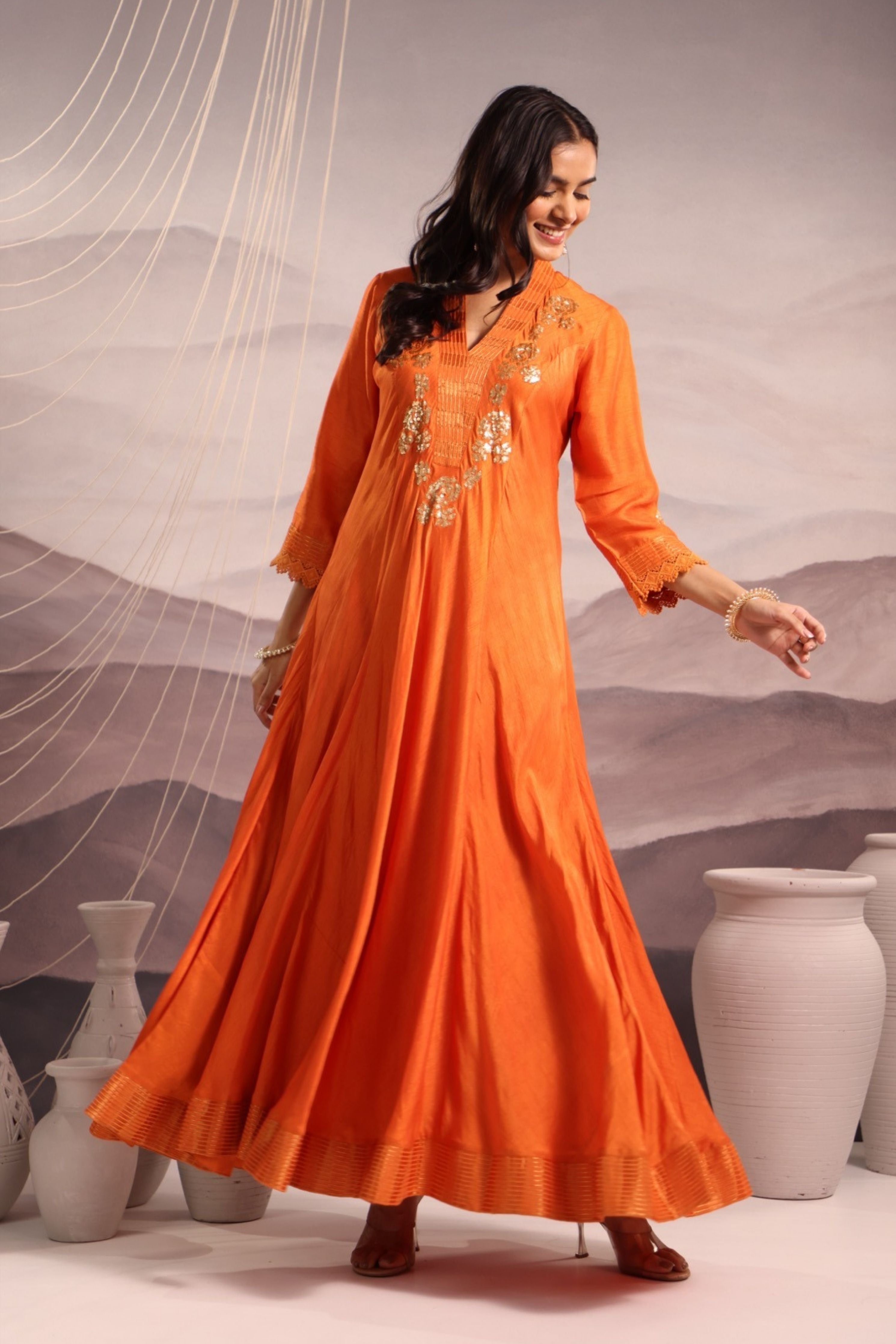 Orange sequin embroidered flared panelled kurta