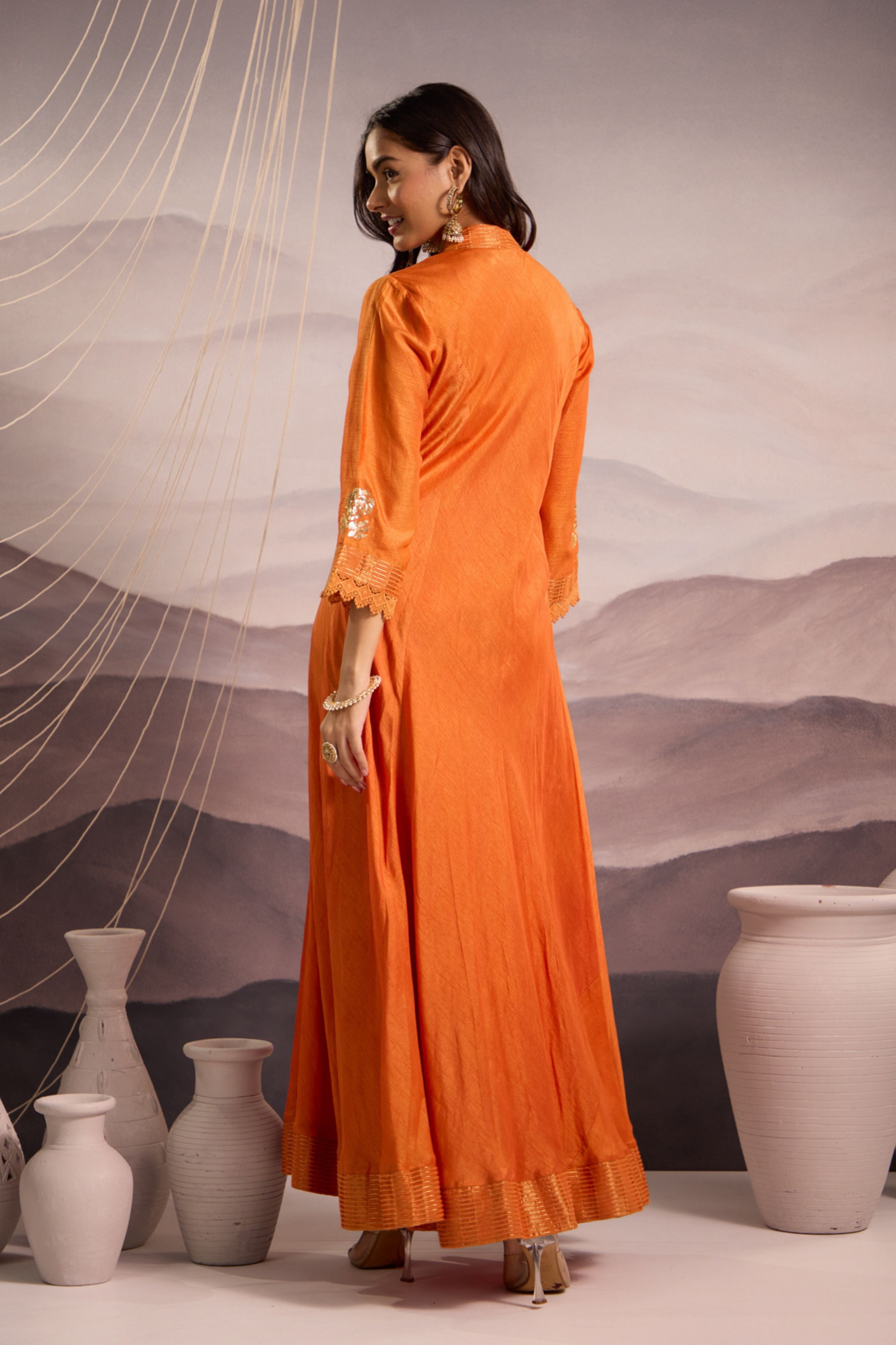 Orange sequin embroidered flared panelled kurta