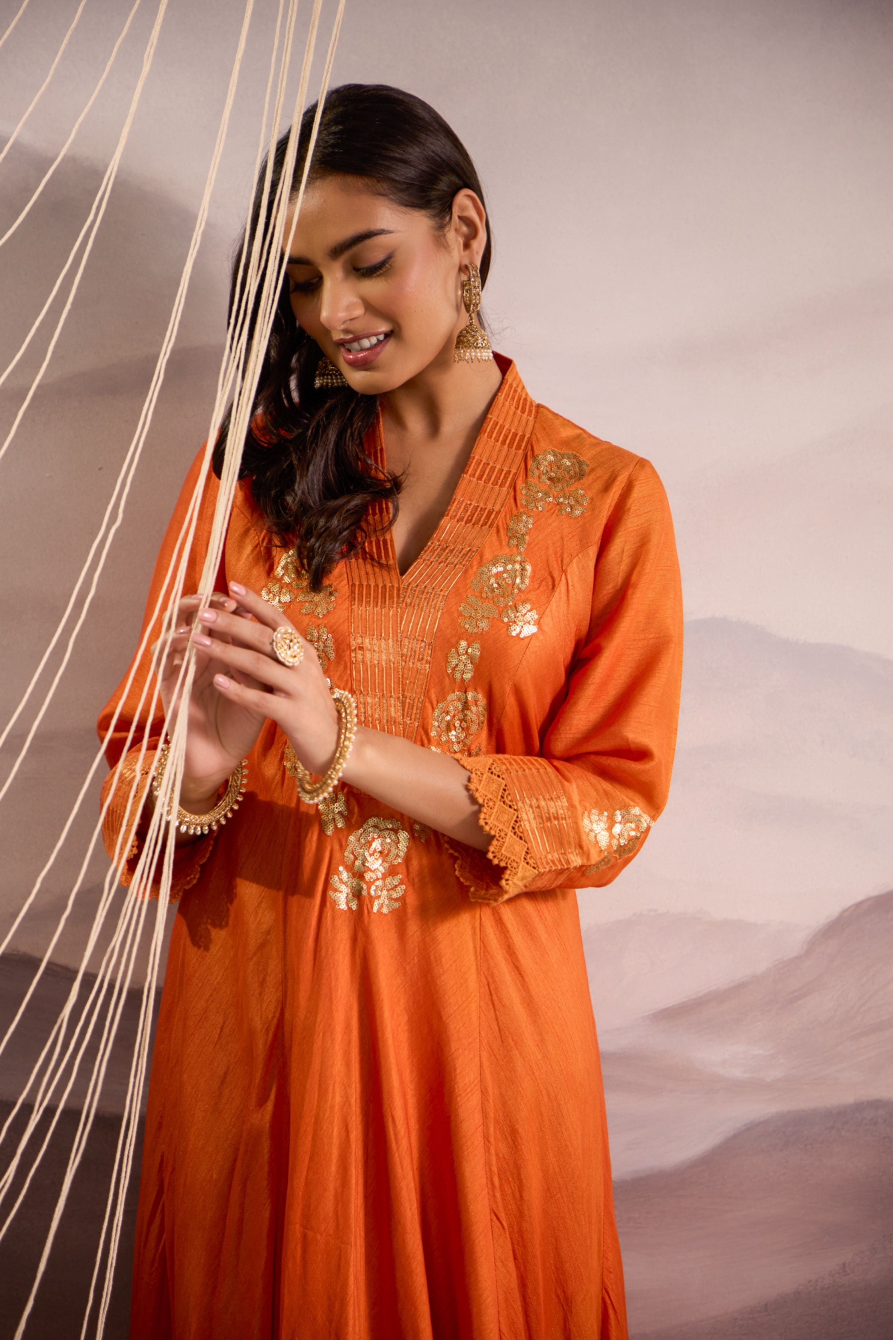 Orange sequin embroidered flared panelled kurta