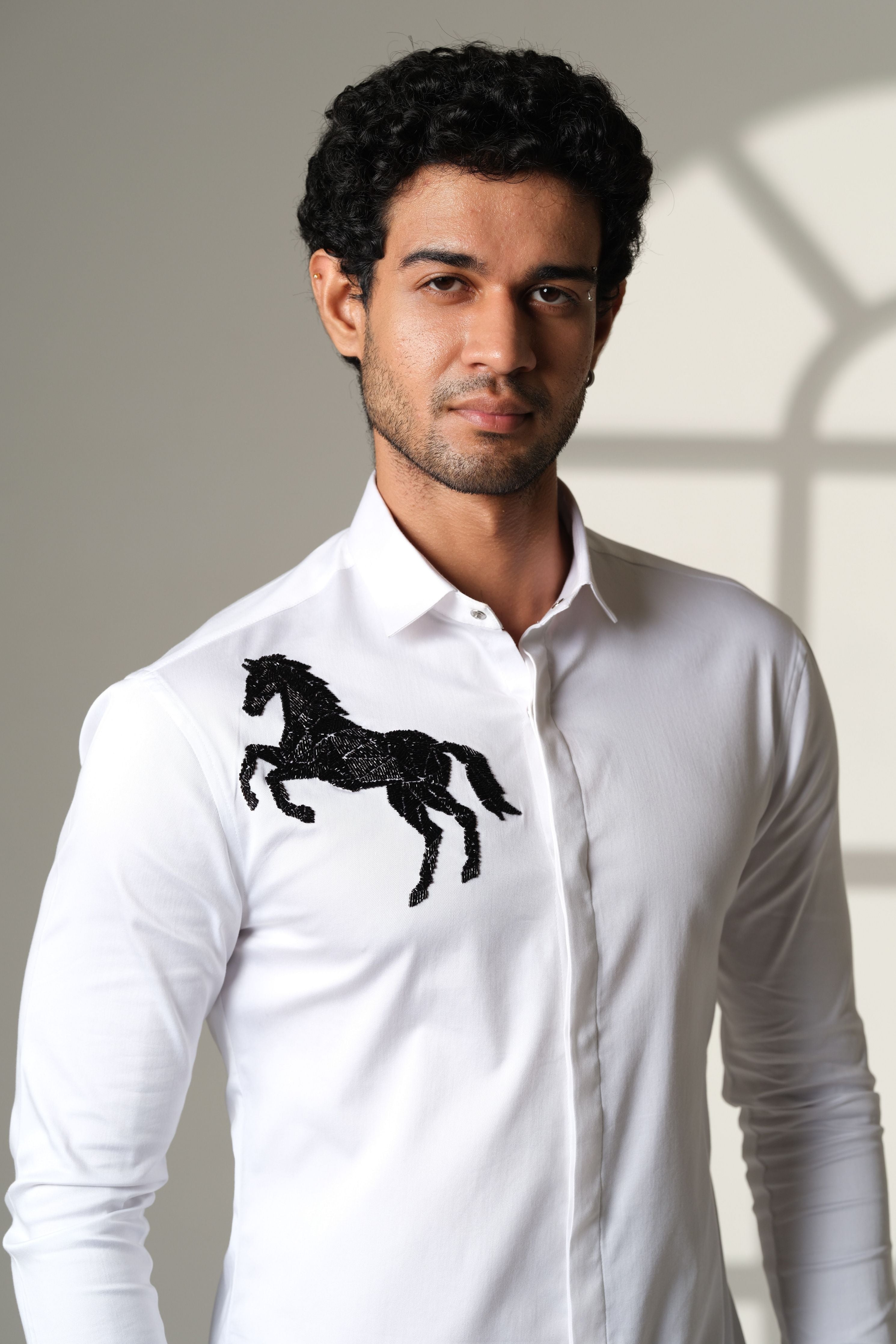 White Shirt Black Horse On Right Shoulder