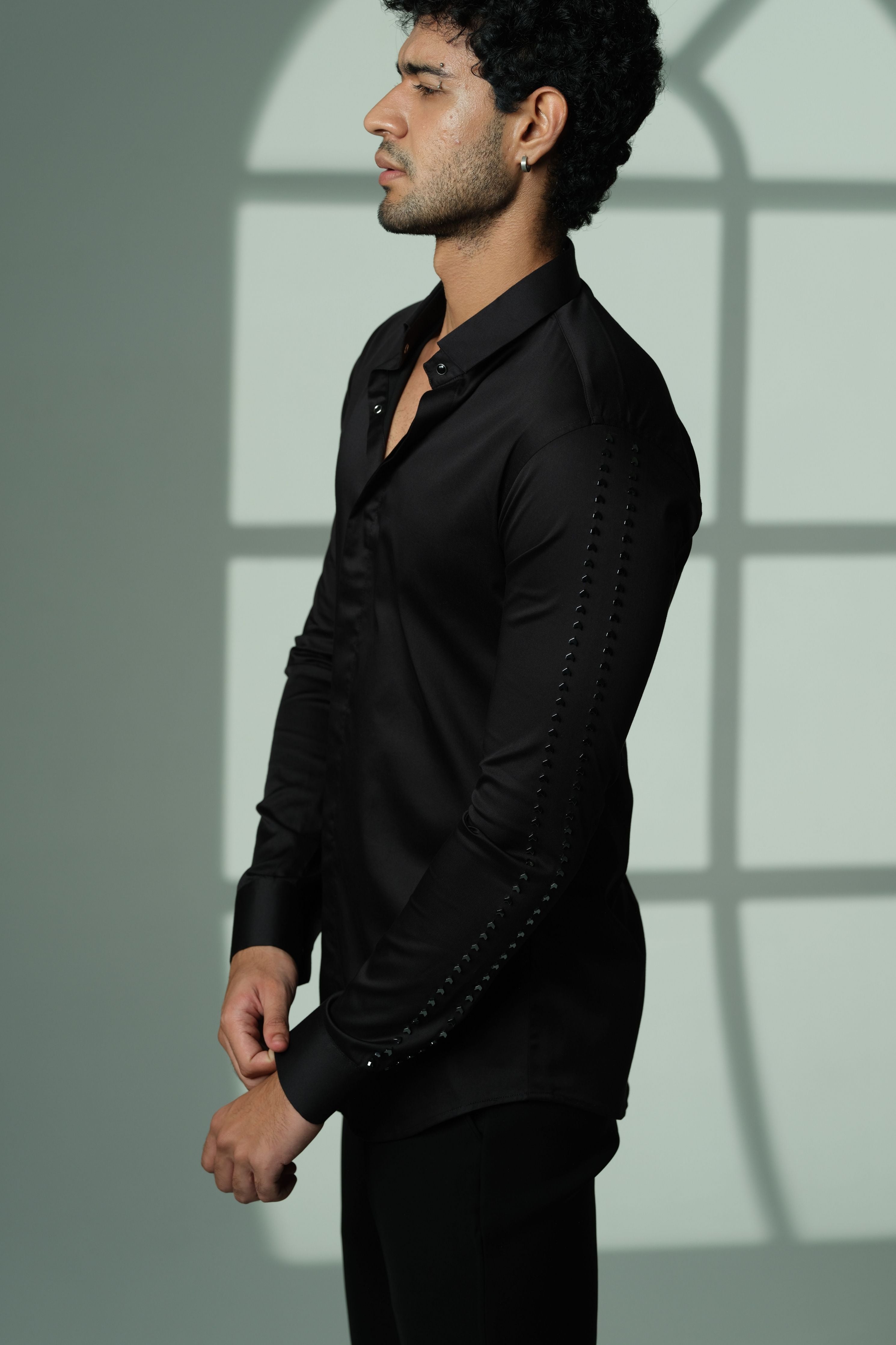 Black Shirt With Parallel Arrow Lines On Sleeves