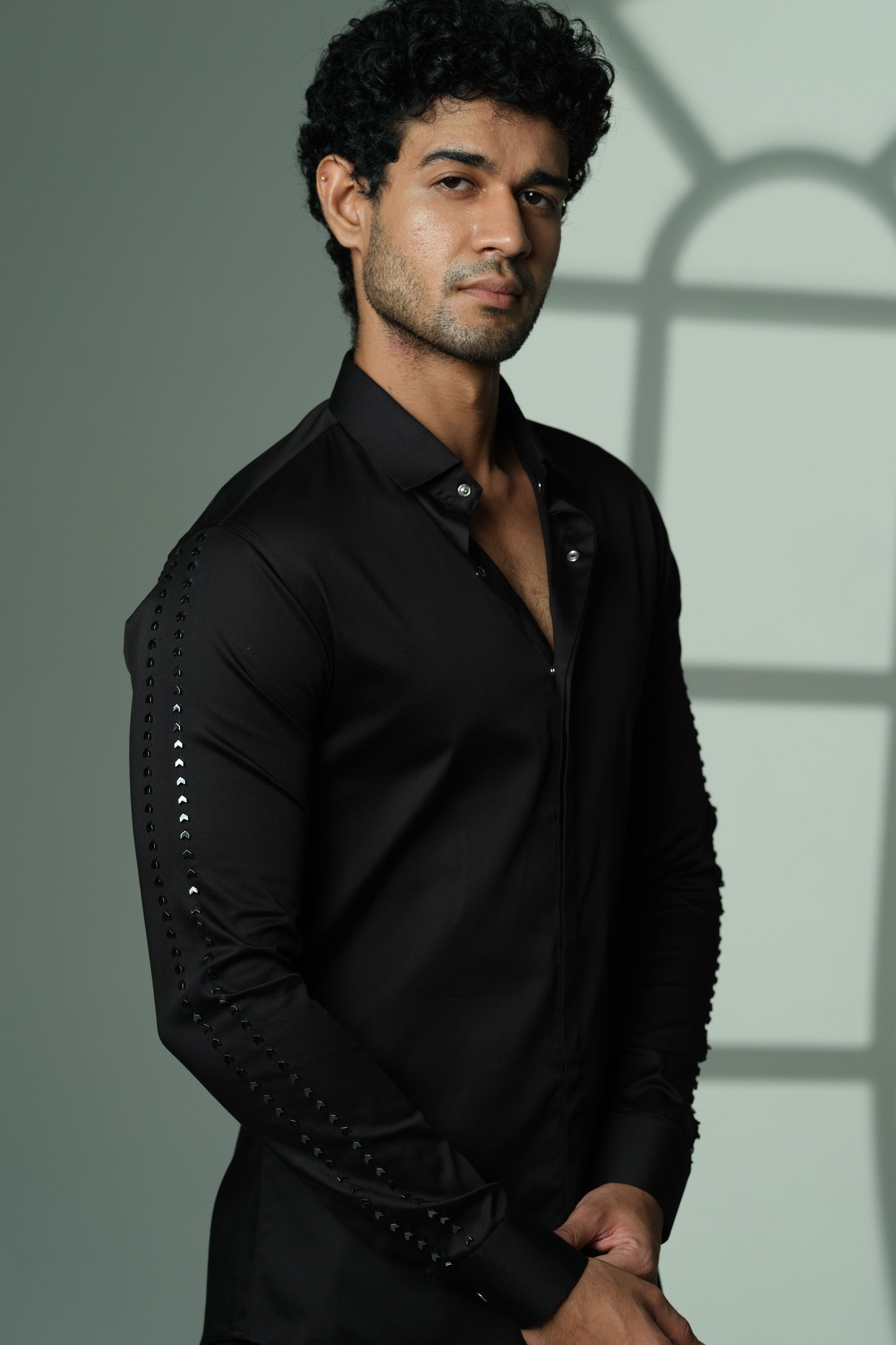 Black Shirt With Parallel Arrow Lines On Sleeves