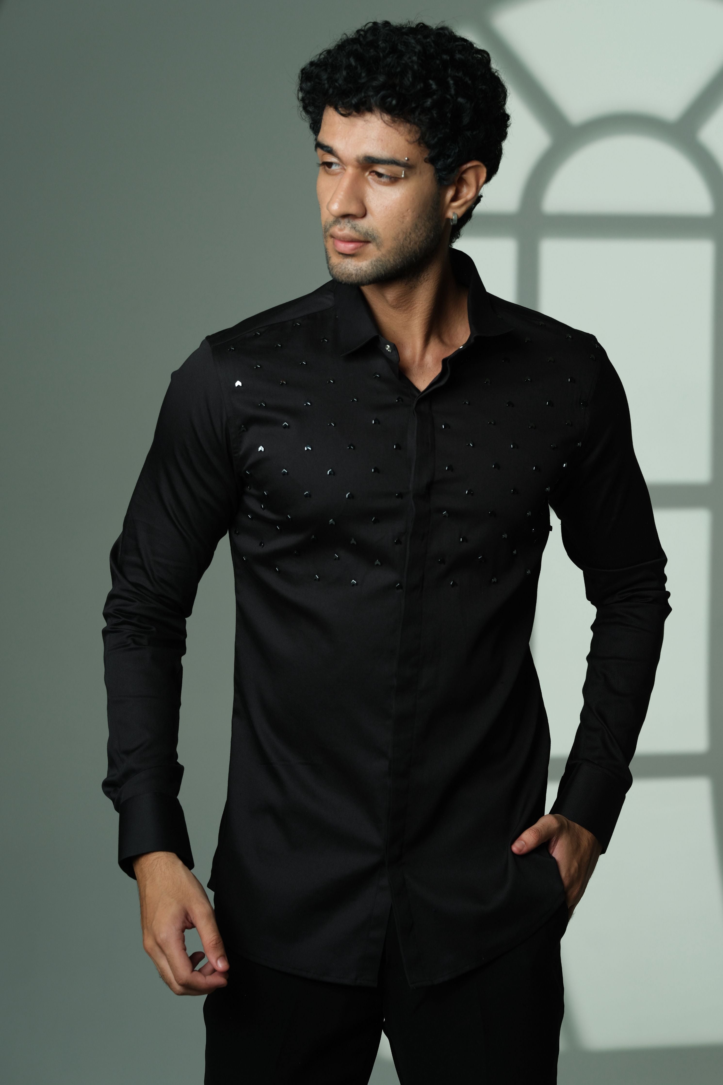 Black Shirt With Arrows Embellishment On half Of The Shirt