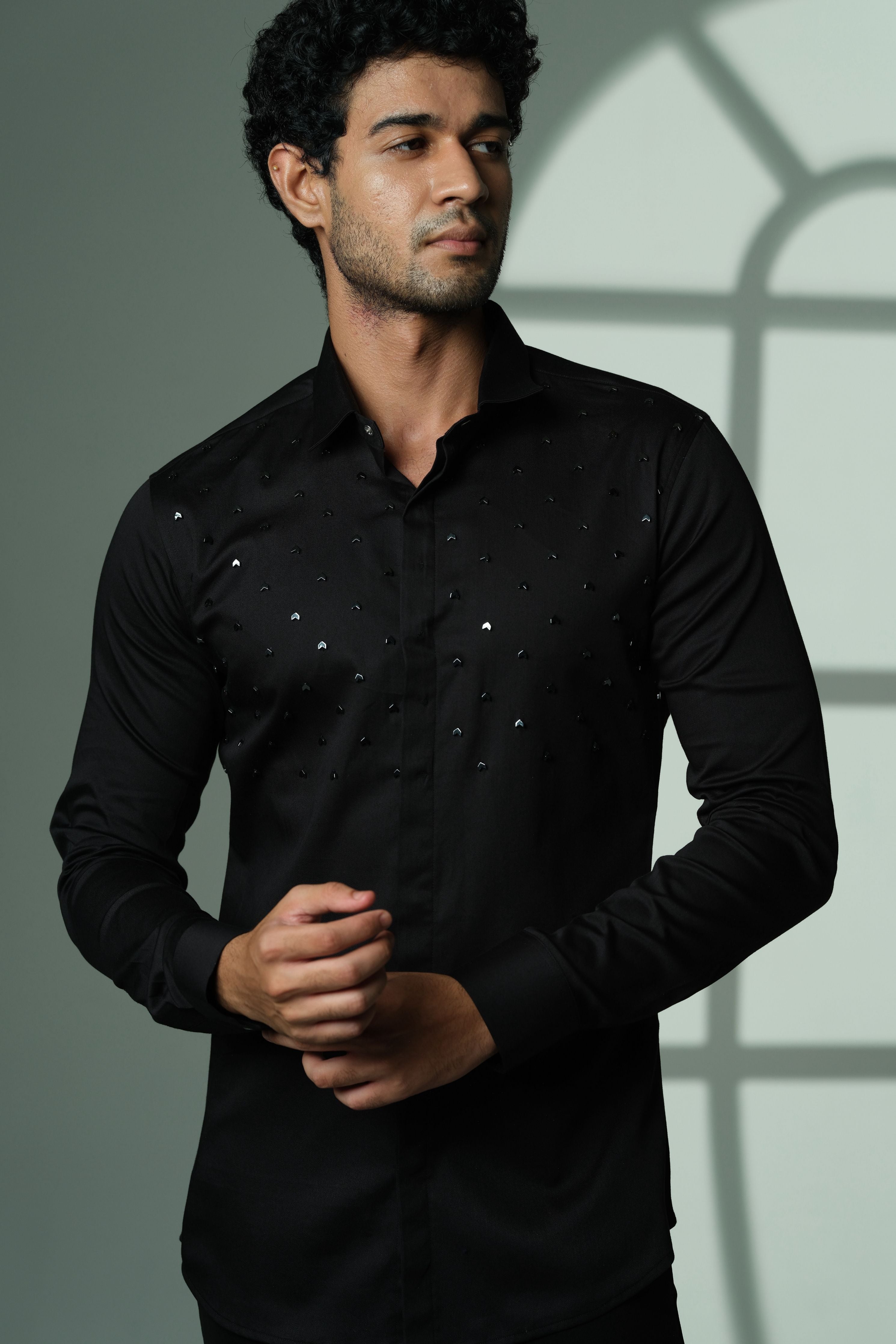 Black Shirt With Arrows Embellishment On half Of The Shirt