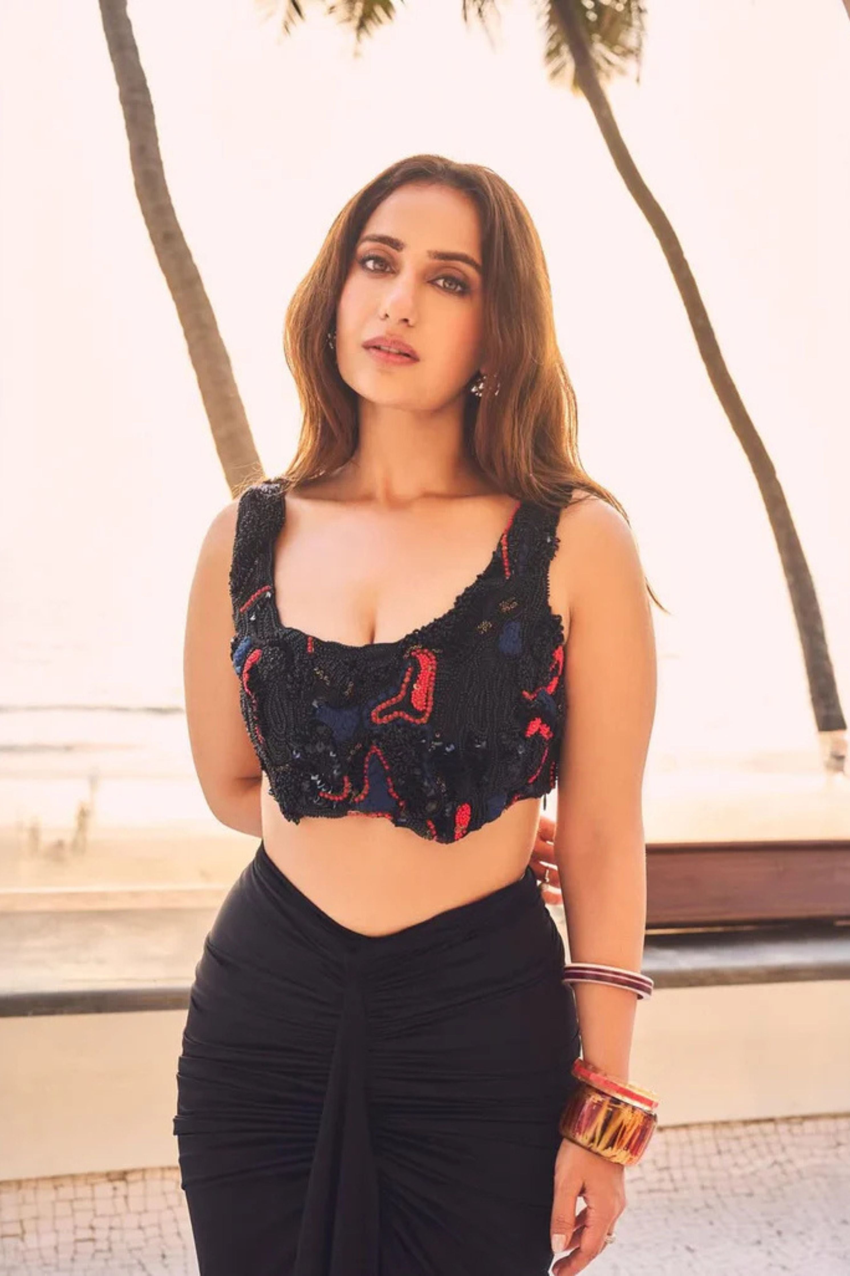 Kusha Kapila in the Noir draped skirt