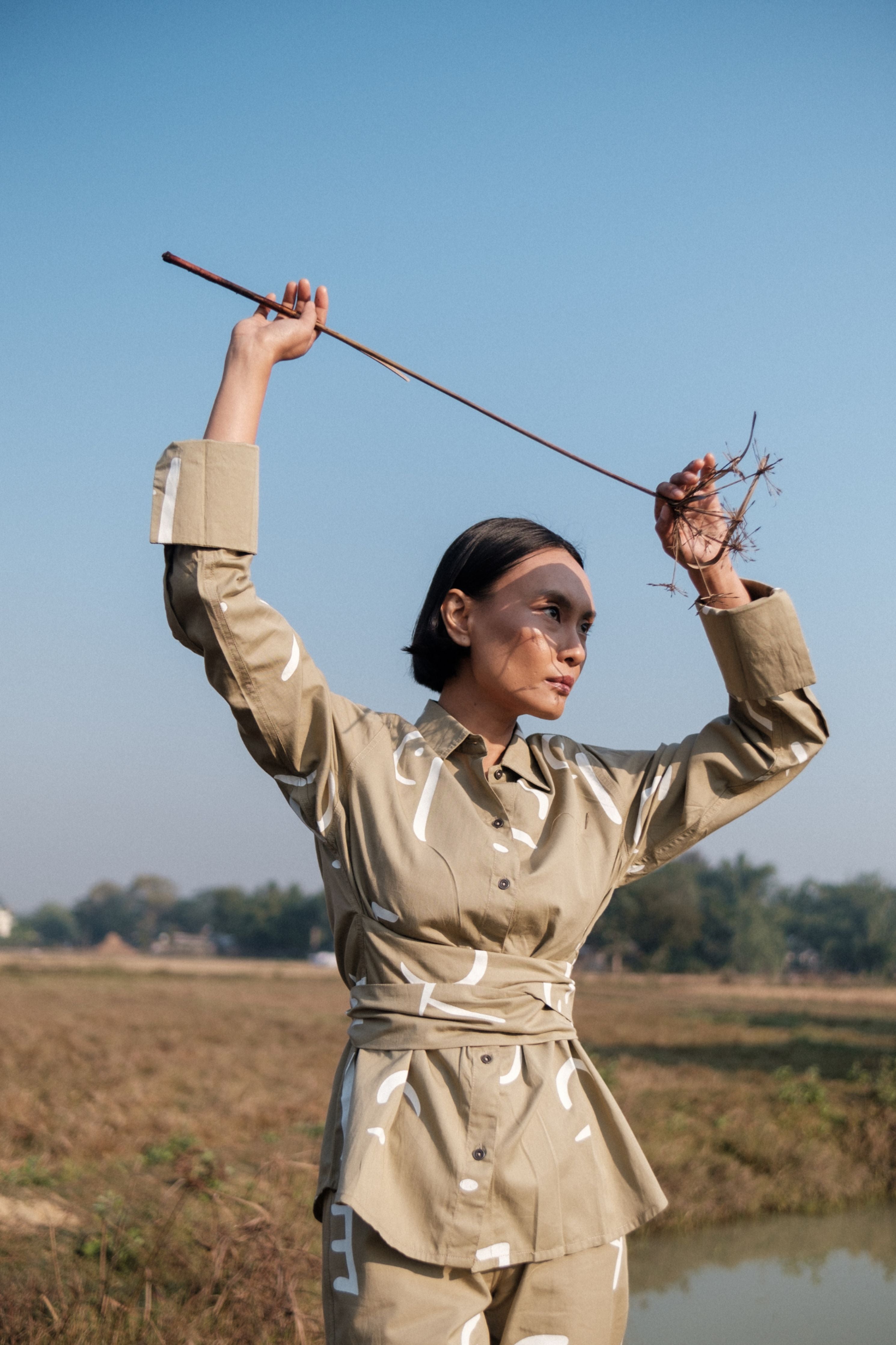 Mira Kapoor In Nara Front knot Shirt - Line Printed