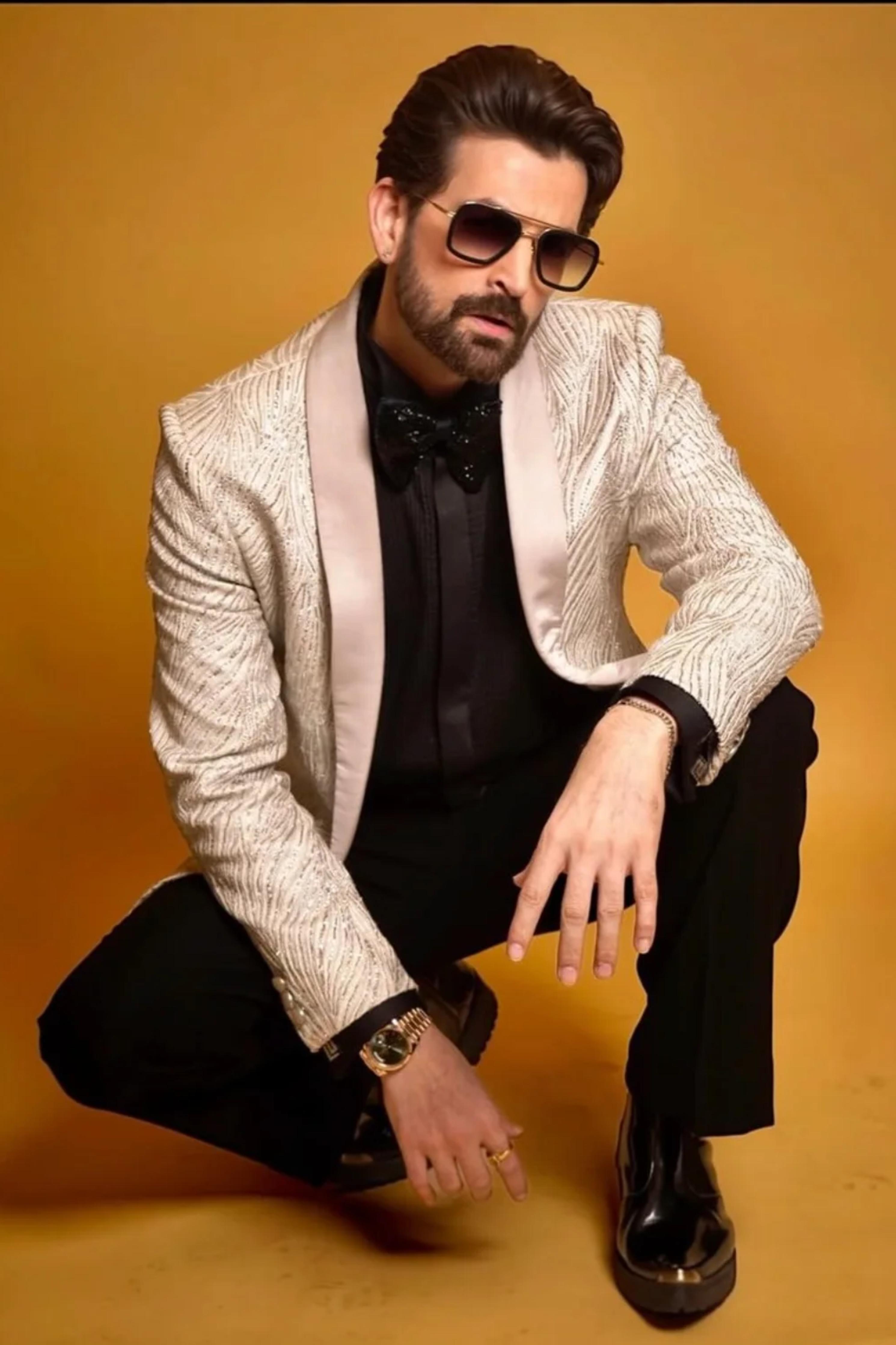 Neil Nitin Mukesh in Pristine Whiteness Tuxedo Set