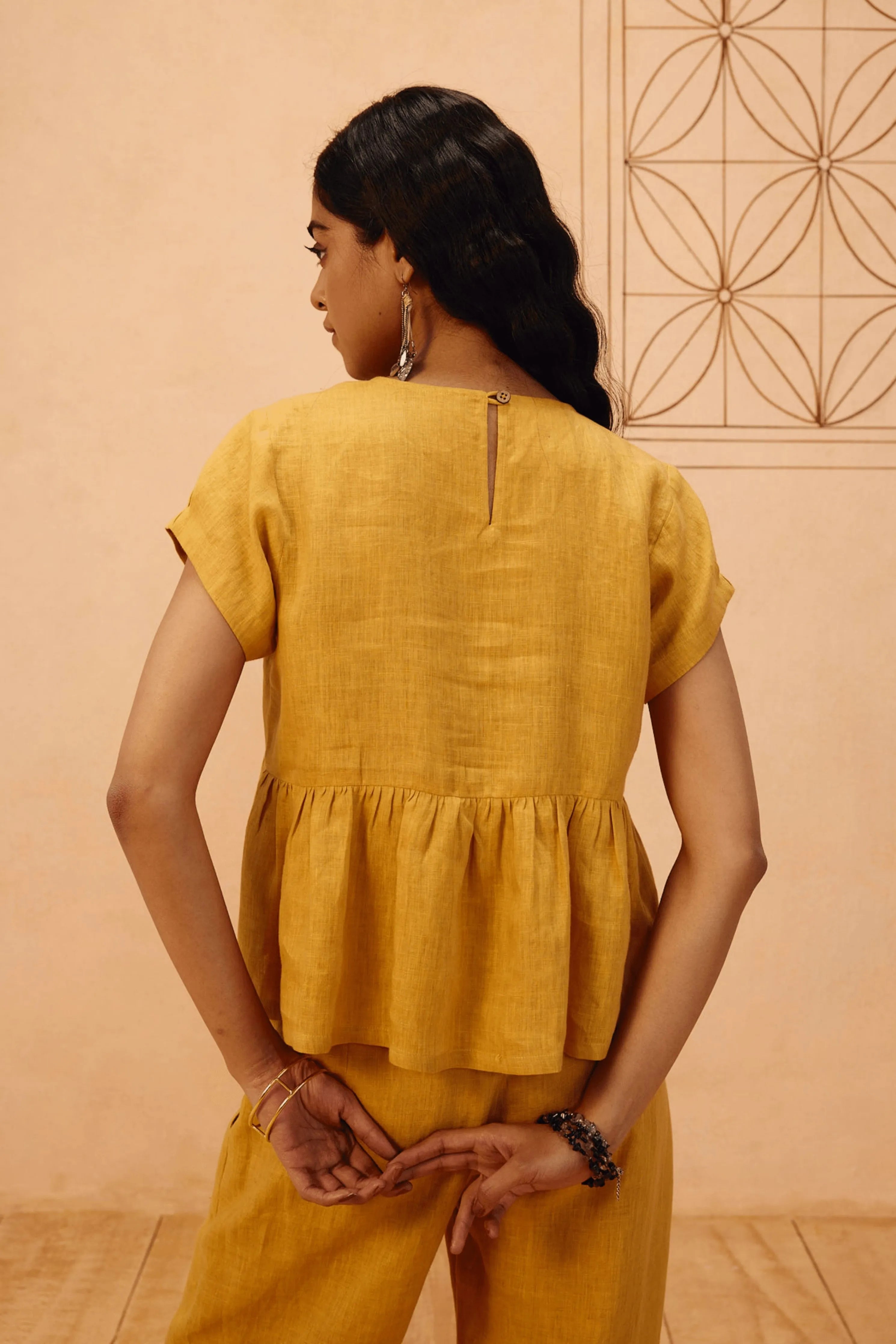 The Ghar Linen Peplum Top