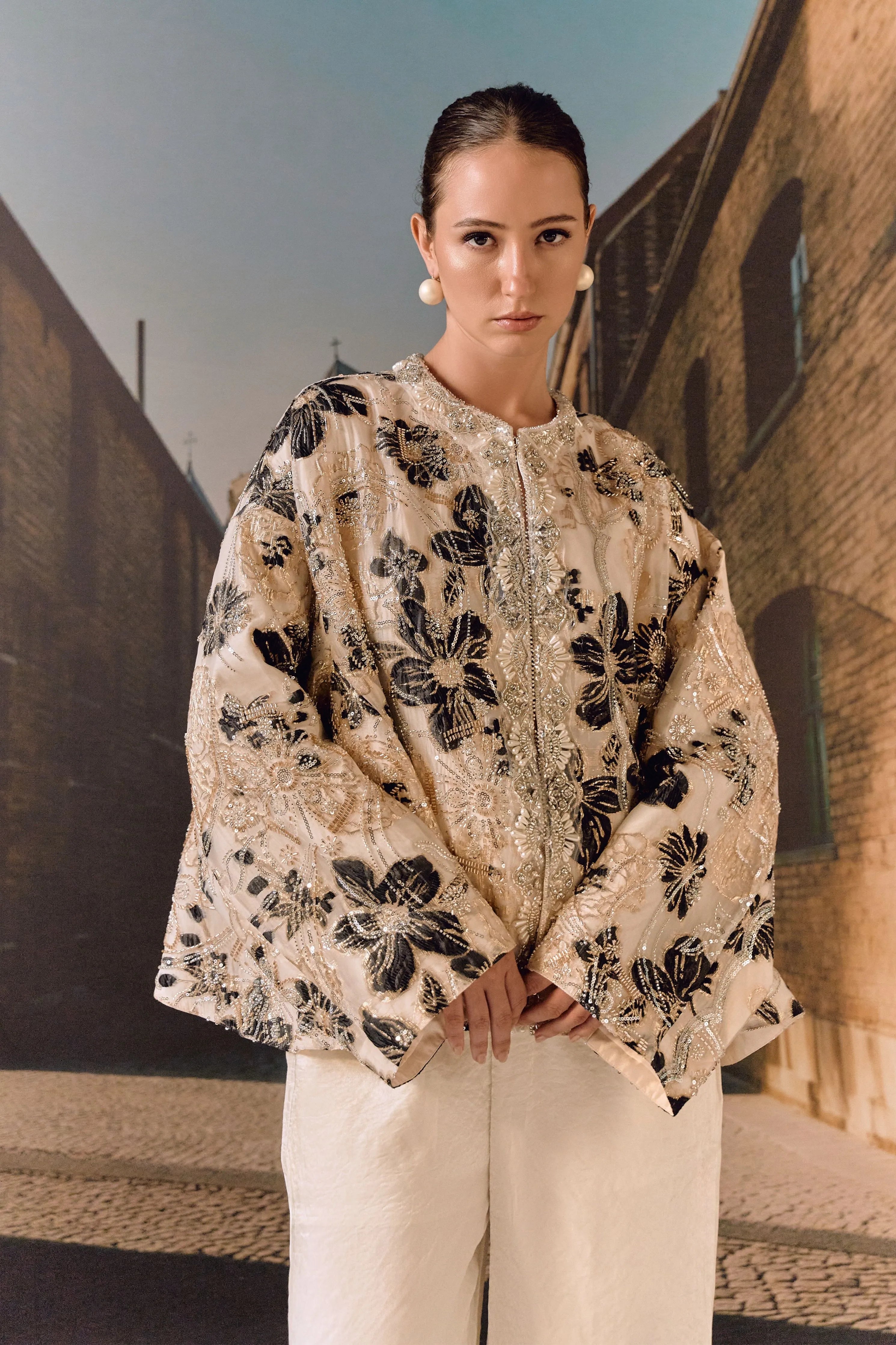 Cape jacket with floral embroidery