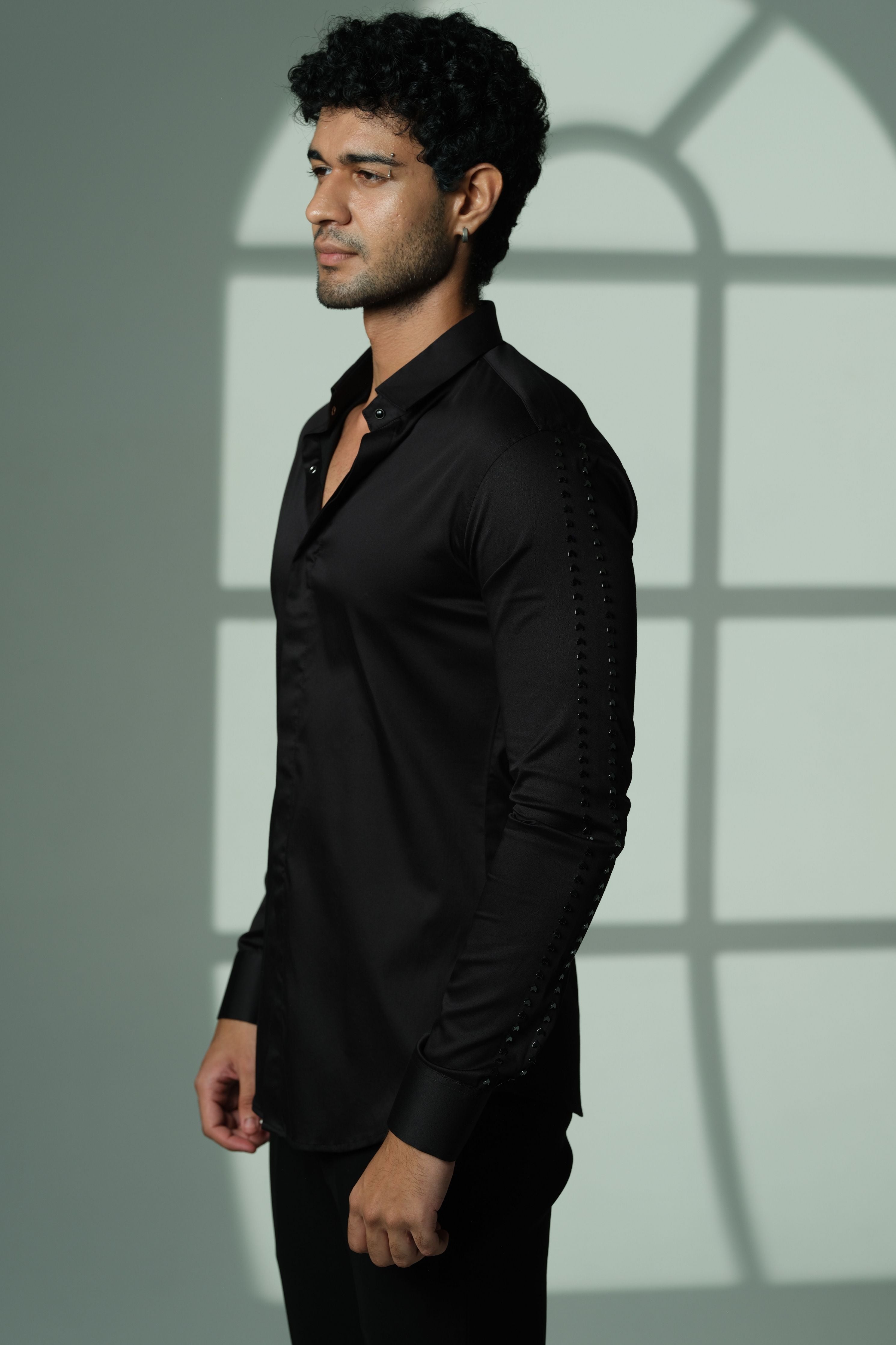 Black Shirt With Parallel Arrow Lines On Sleeves