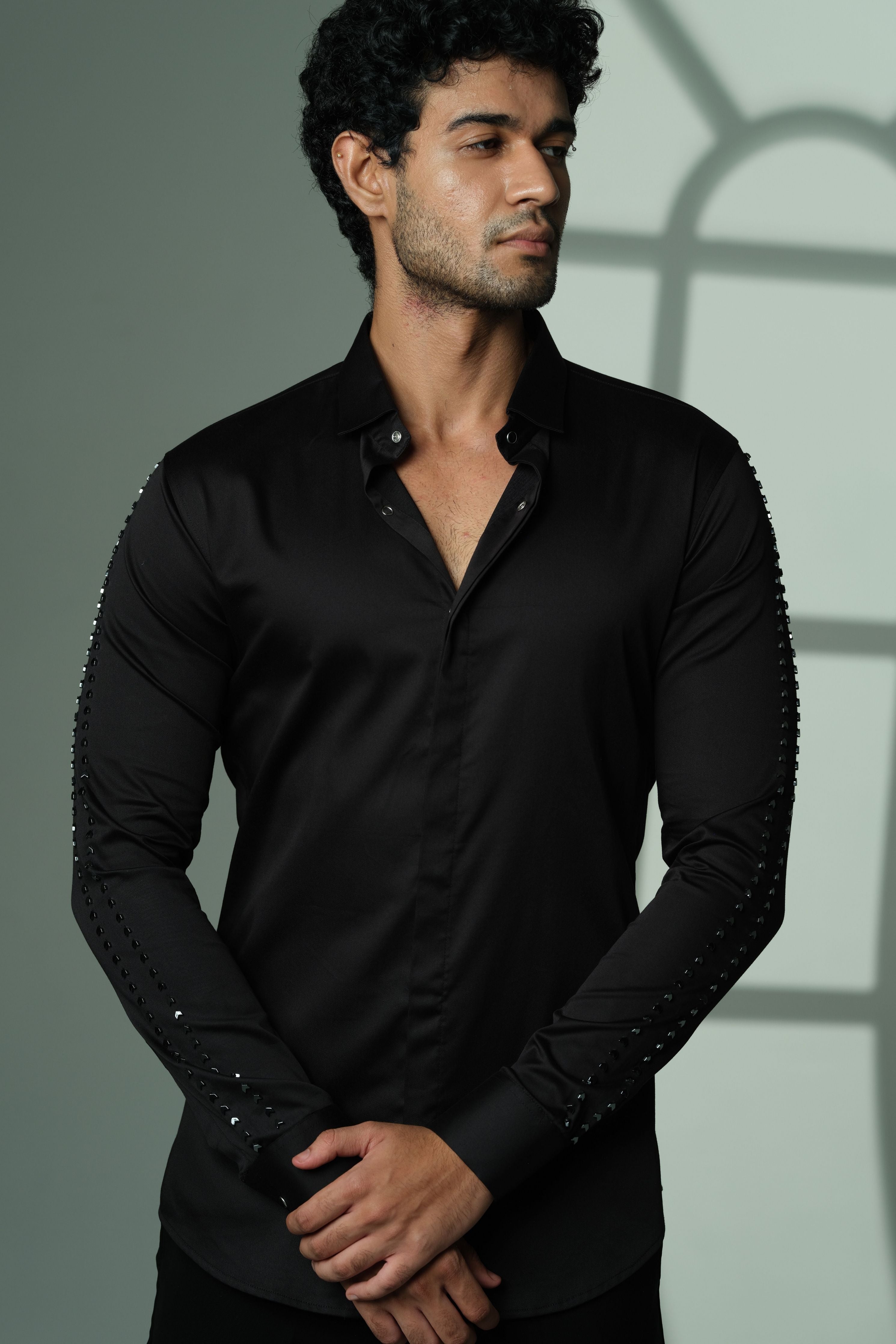 Black Shirt With Parallel Arrow Lines On Sleeves