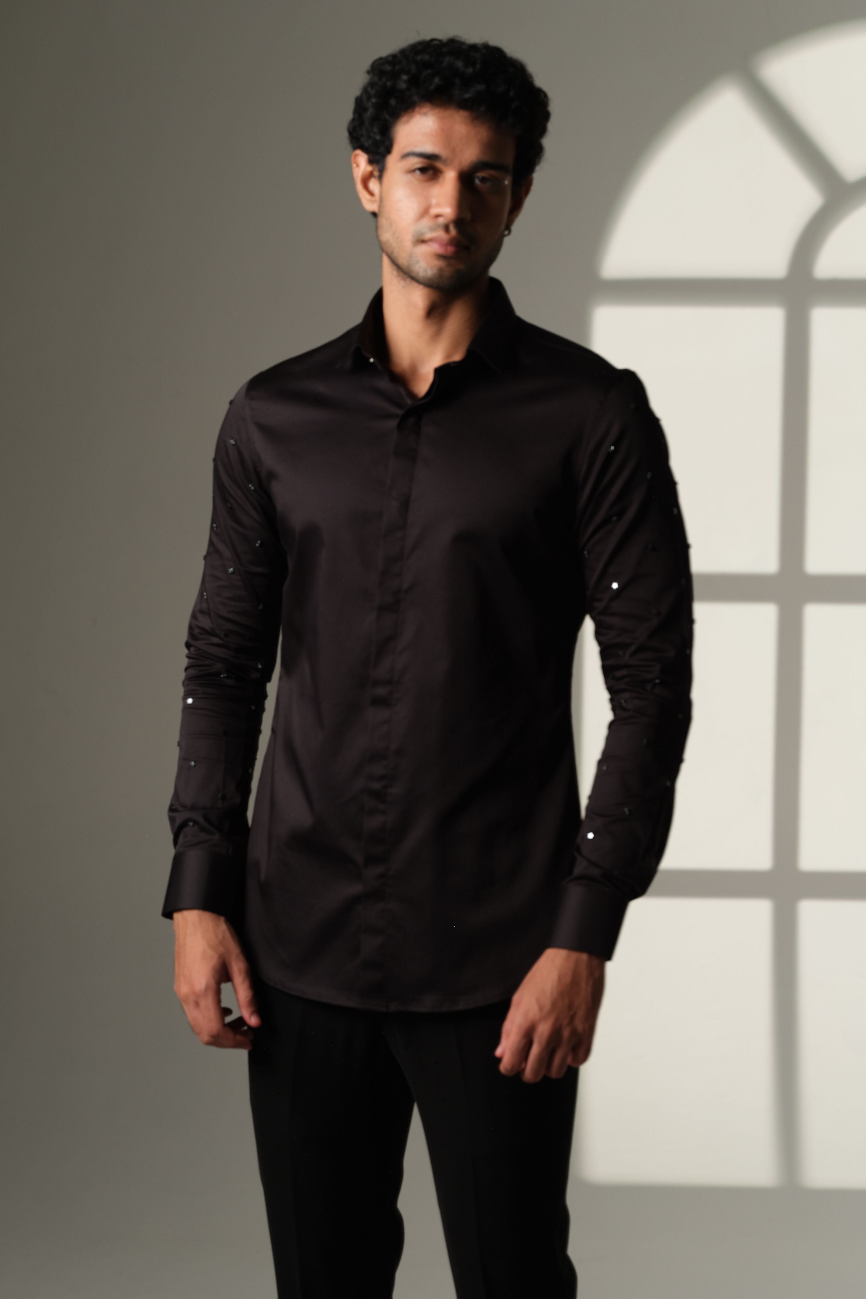 Black Shirt With Artisanal Star Embellishment On Both Sleeves