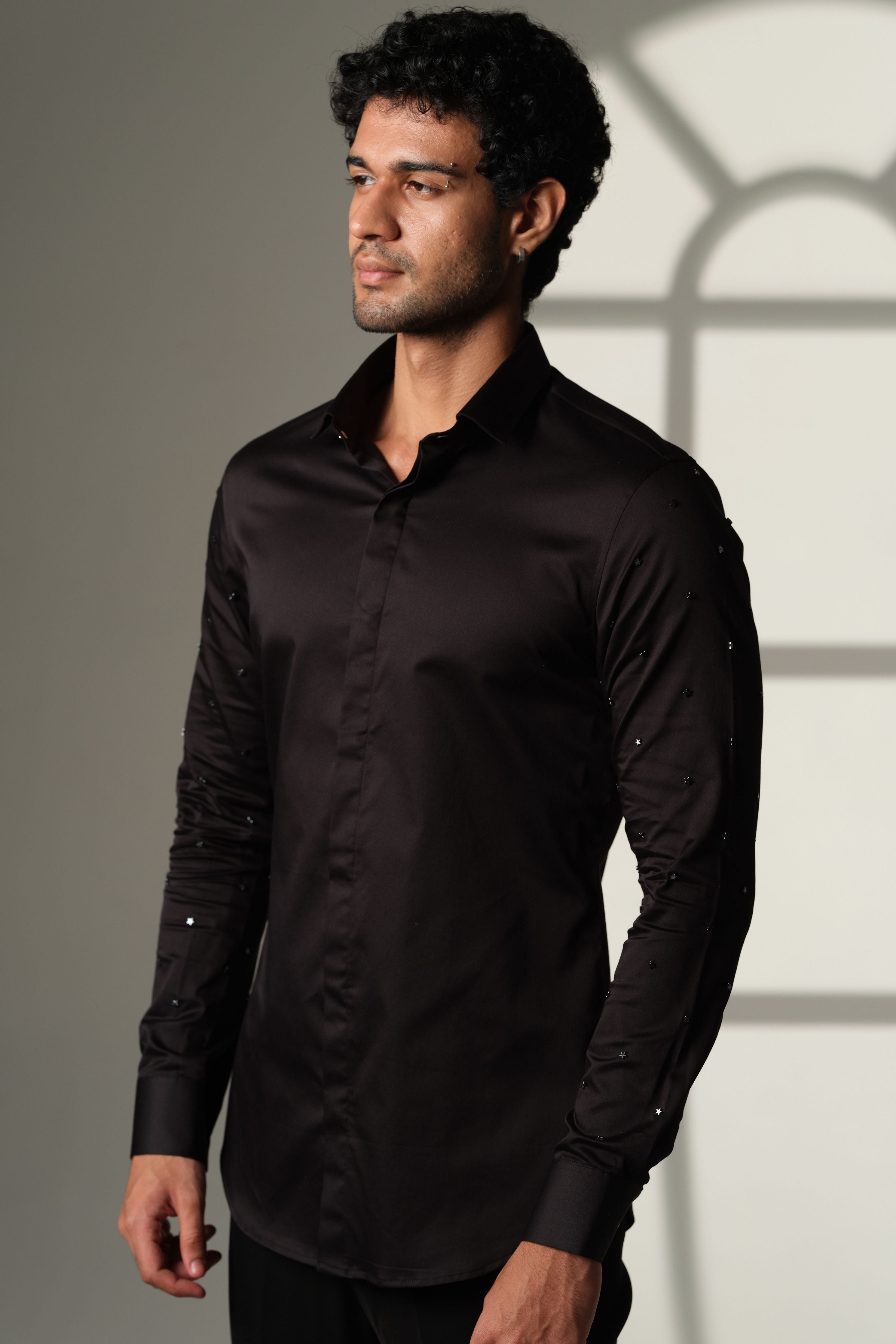 Black Shirt With Artisanal Star Embellishment On Both Sleeves