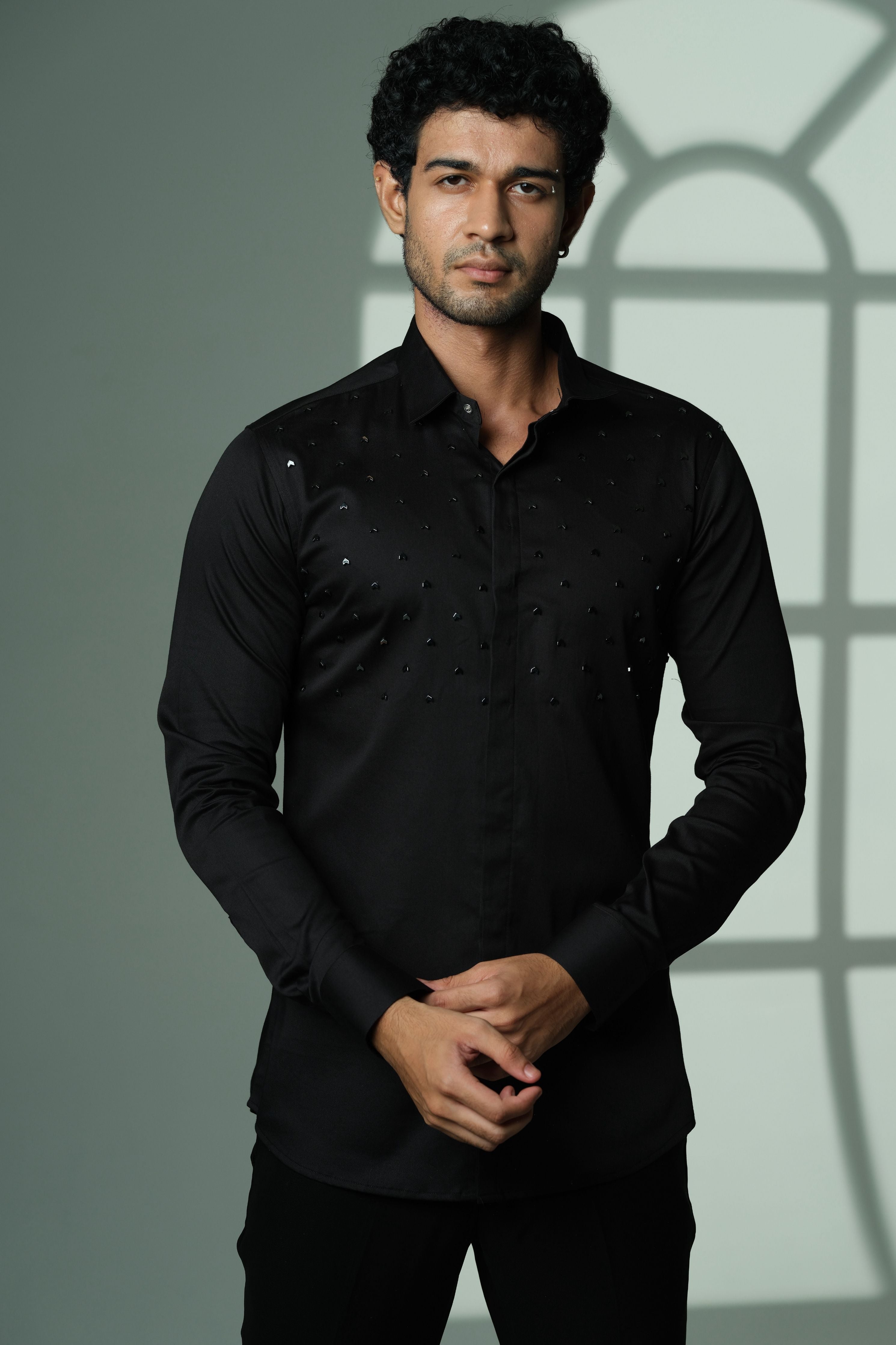 Black Shirt With Arrows Embellishment On half Of The Shirt
